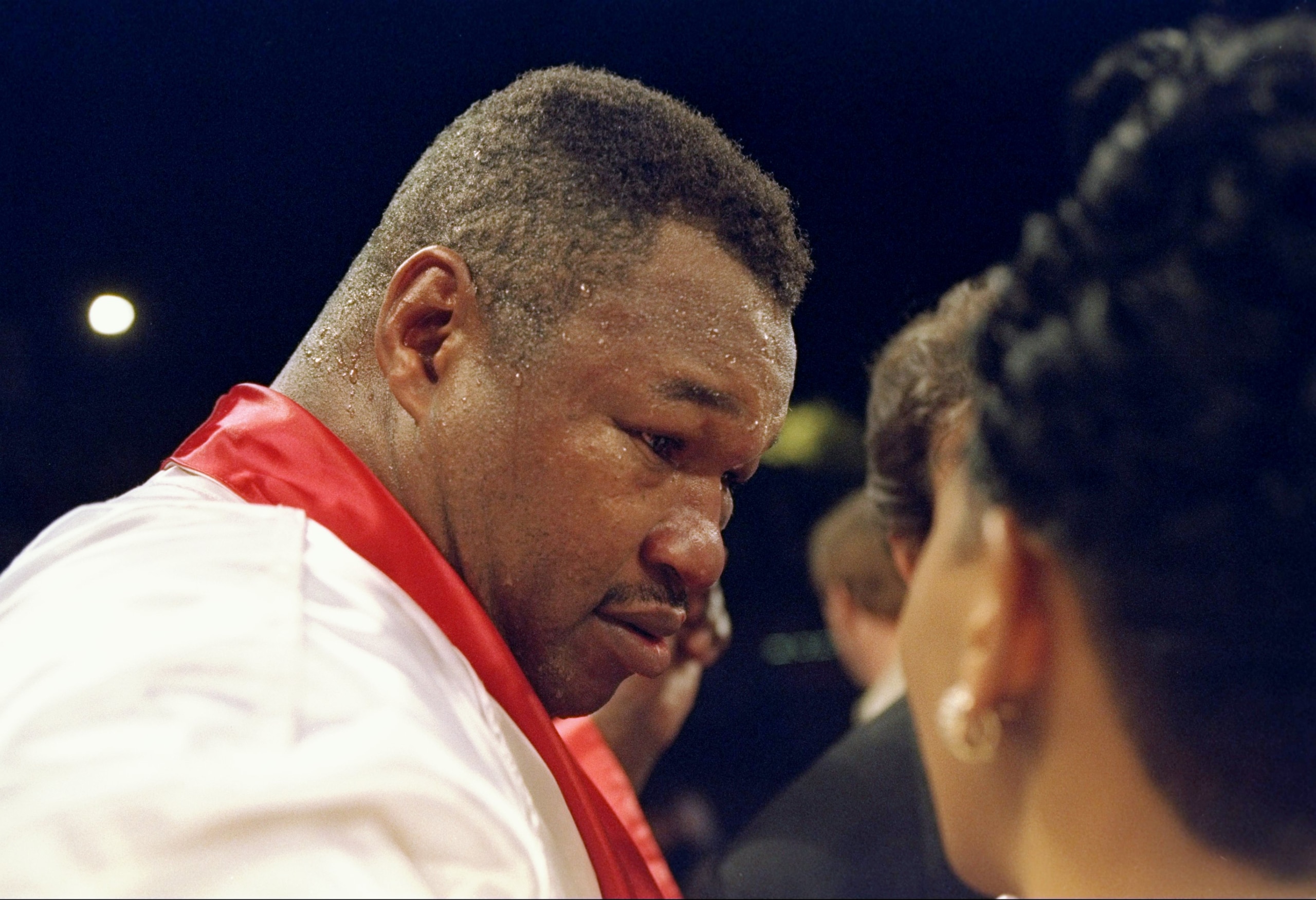8 Apr 1995: Larry Holmes (right) looks on during his fight against Oliver McCall in Las Vegas, Nevada. McCall won the bout with an unanimous decision after 12 rounds.