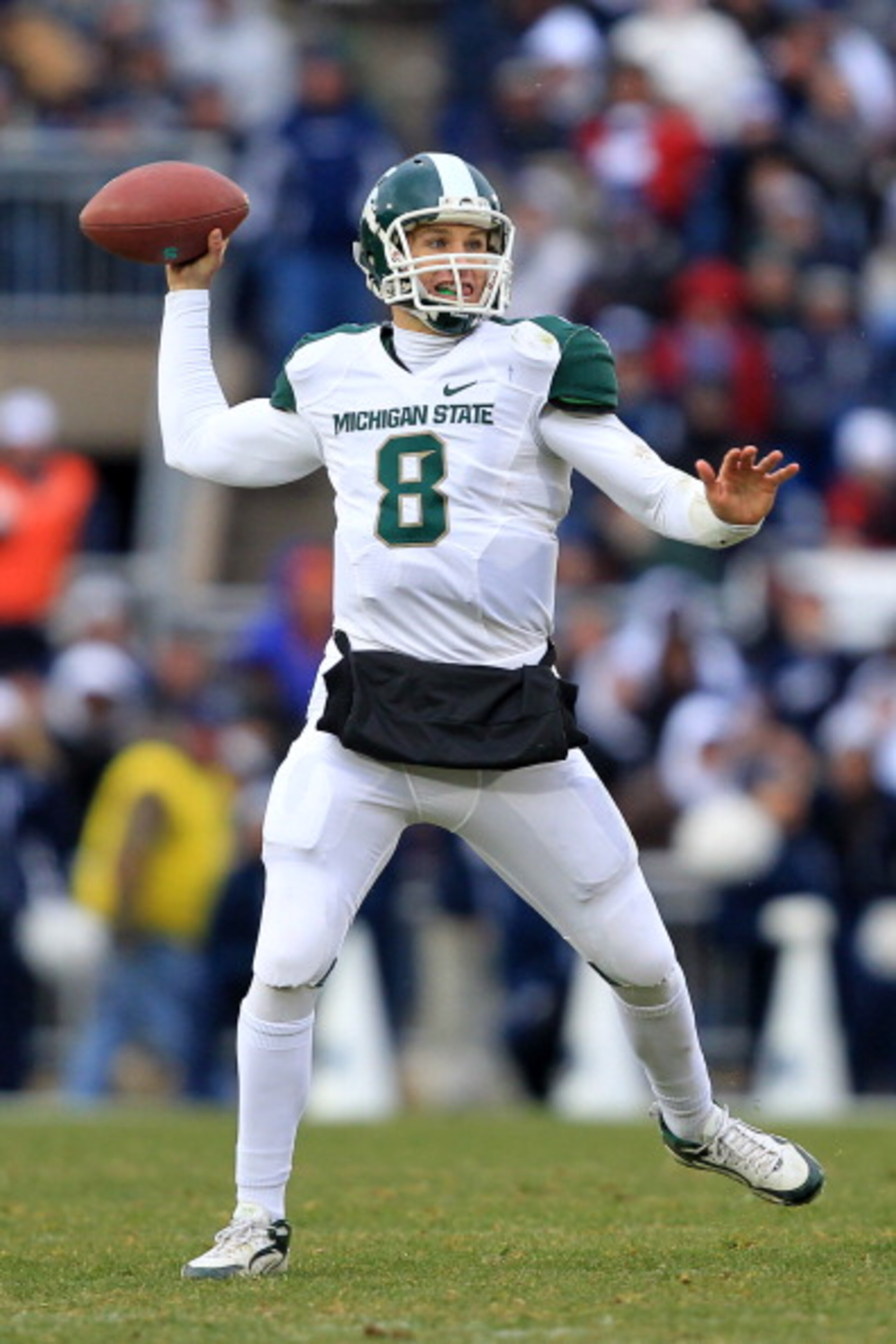 STATE COLLEGE, PA - NOVEMBER 27: Quarterback Kirk Cousins #8 of the Michigan State Spartans throws a pass during a game against the Penn State Nittany Lions on November 27, 2010 at Beaver Stadium in State College, Pennsylvania. The Spartans won 28-22. (Ph