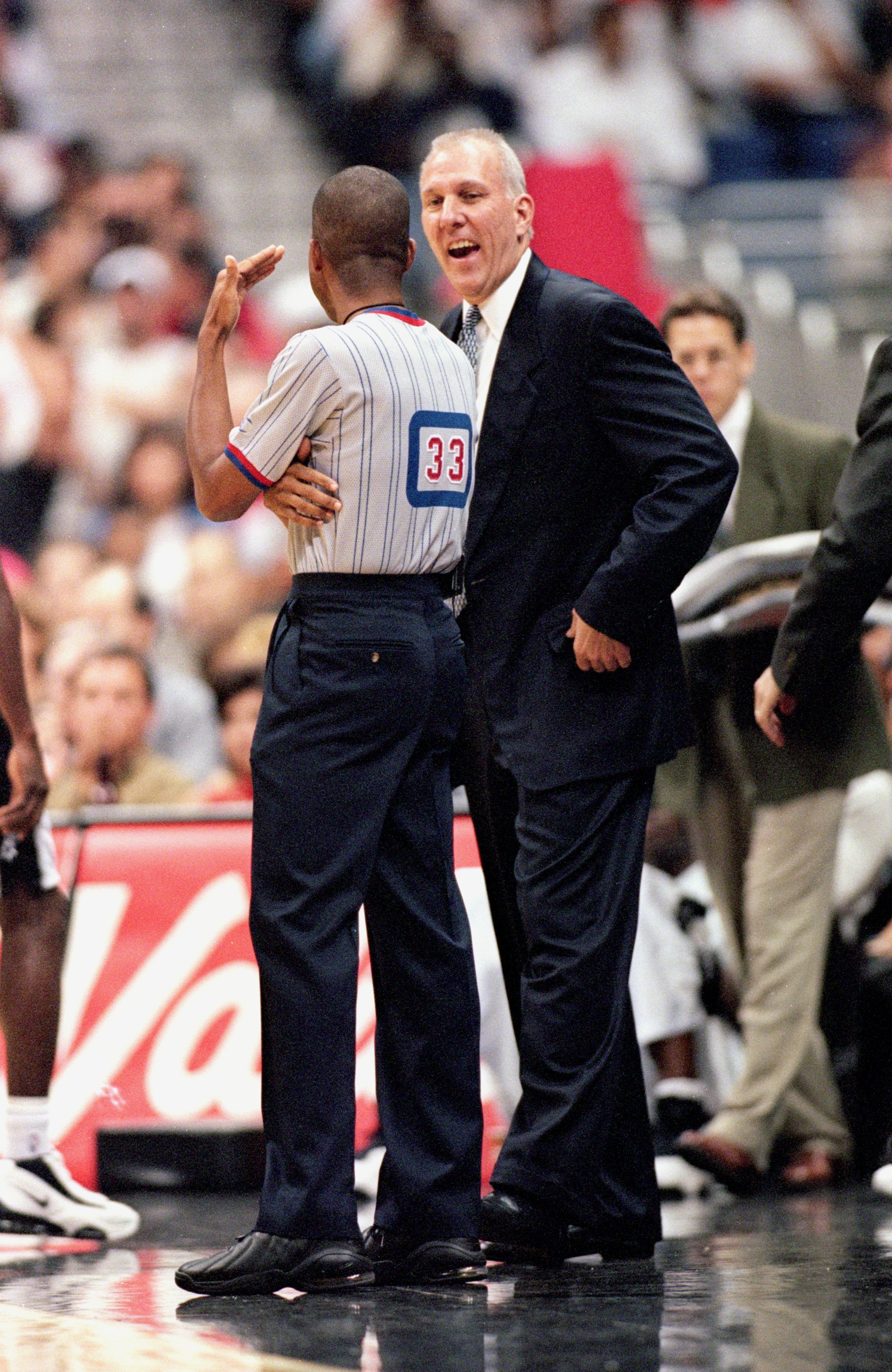 31 Oct 2000: Head Coach Gregg Popovich  of the San Antonio Spurs laughs with the referee during the game against the Indiana Pacers at the Alamodome in San Antonio, Texas. The Spurs defeated the Pacers 98-85.    NOTE TO USER: It is expressly understood th