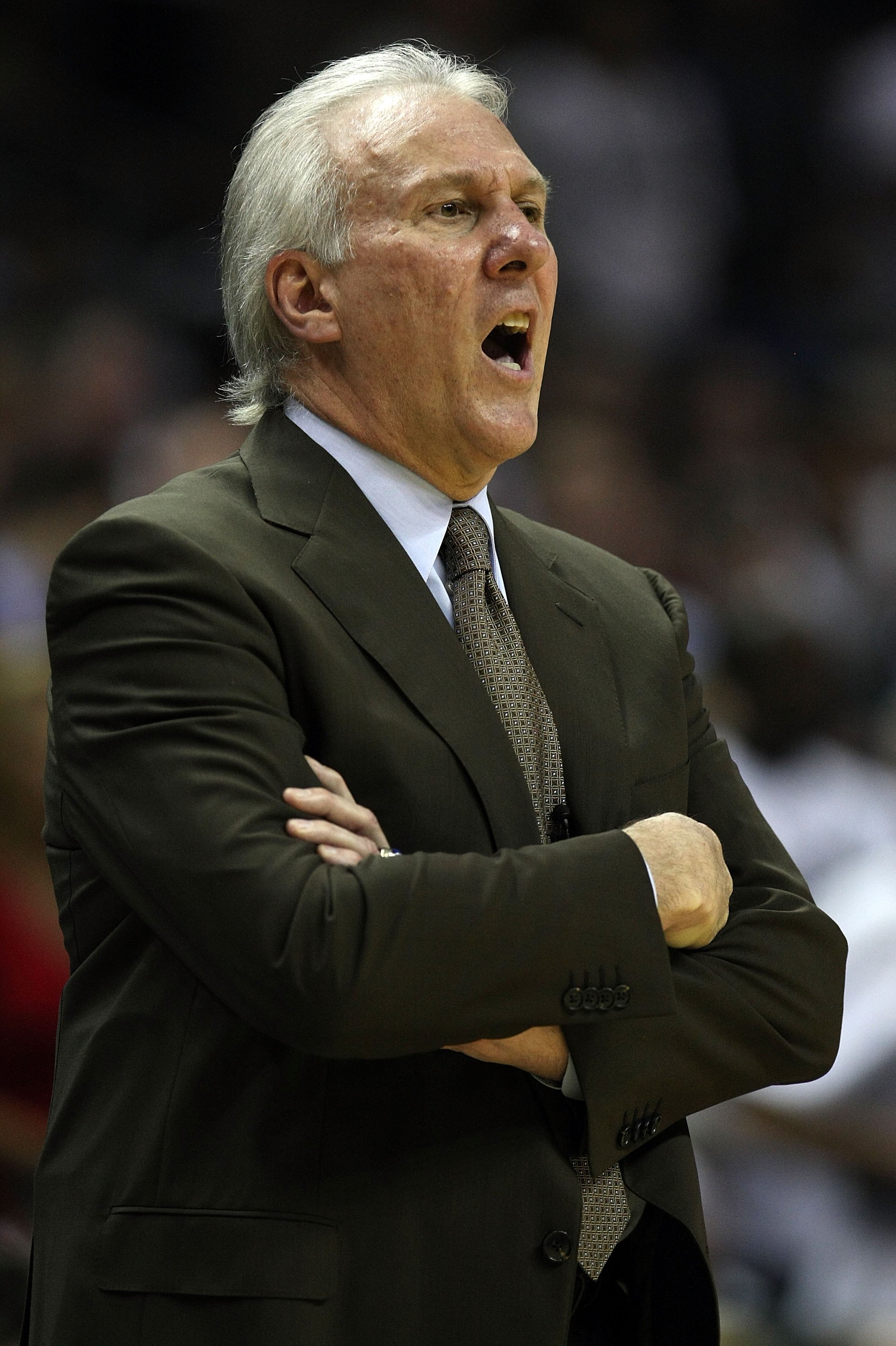SAN ANTONIO - MAY 27:  Head coach Gregg Popovich of the San Antonio Spurs calls out while taking on the Los Angeles Lakers in Game Four of the Western Conference Finals during the 2008 NBA Playoffs on May 27, 2008 at the AT&T Center in San Antonio, Texas.