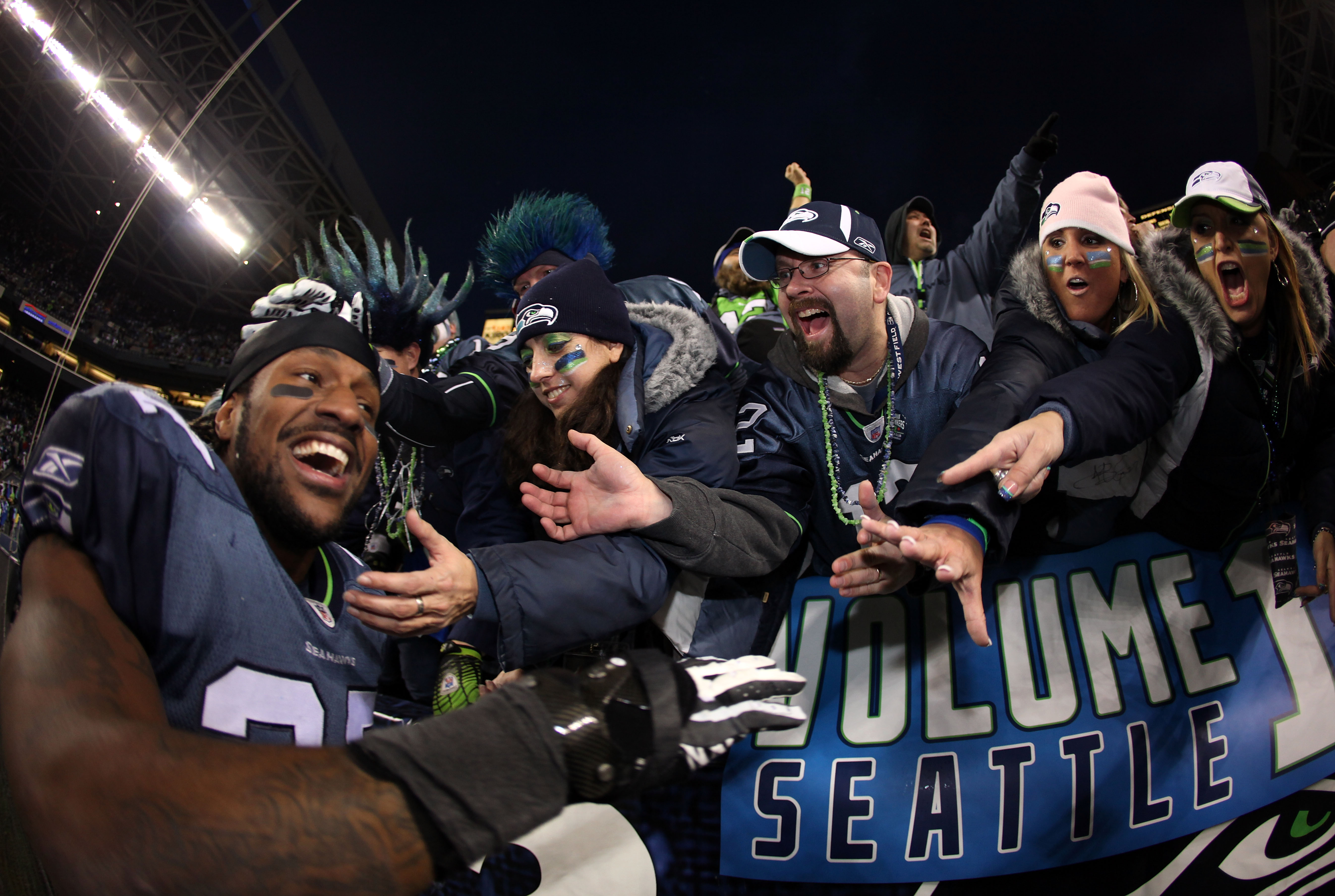 Seattle Seahawks fans celebrate a go score against the Dallas