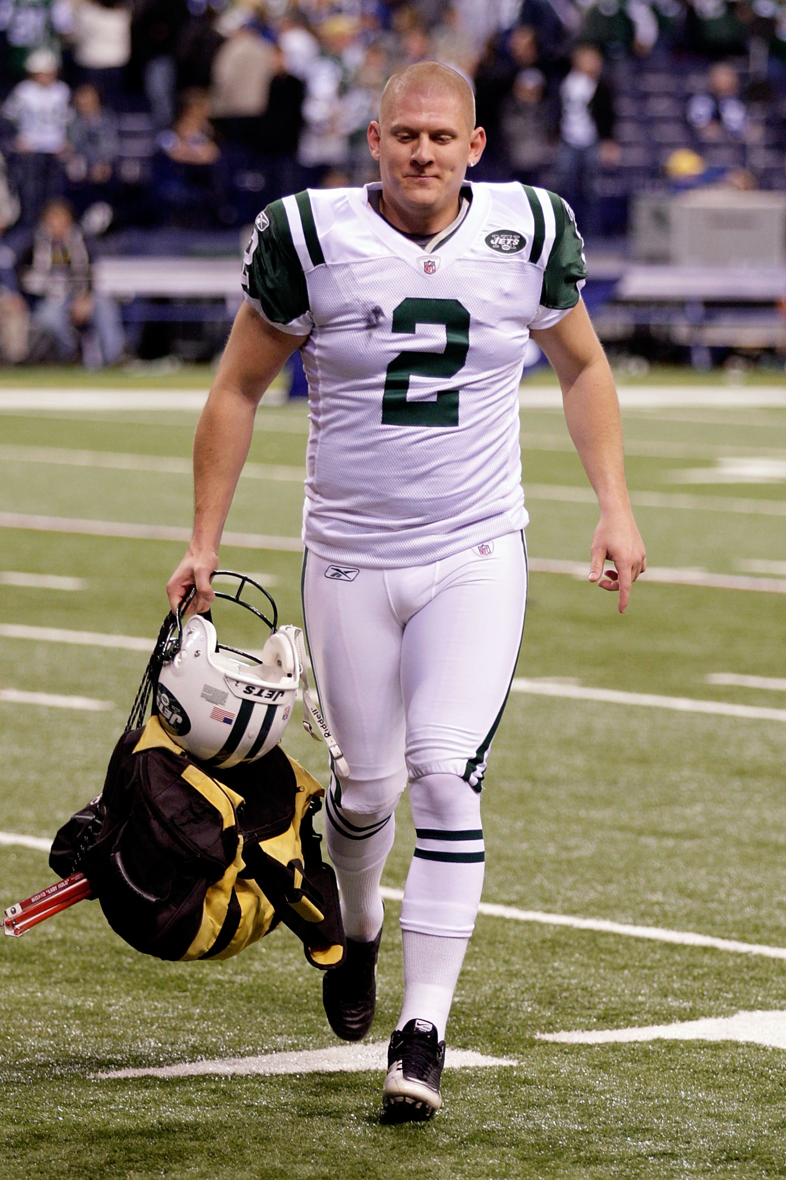 INDIANAPOLIS, IN - JANUARY 08: Kicker Nick Folk #2 of the New York Jets walks off the field after he kicked a game-winning 32-yard field goal as time expired to give the Jets a 17-16 win against the Indianapolis Colts during their 2011 AFC wild card pla INDIANAPOLIS, IN - JANUARY 08: Kicker Nick Folk #2 of the New York Jets walks off the field after he kicked a game-winning 32-yard field goal as time expired to give the Jets a 17-16 win against the Indianapolis Colts during their 2011 AFC wild card pla