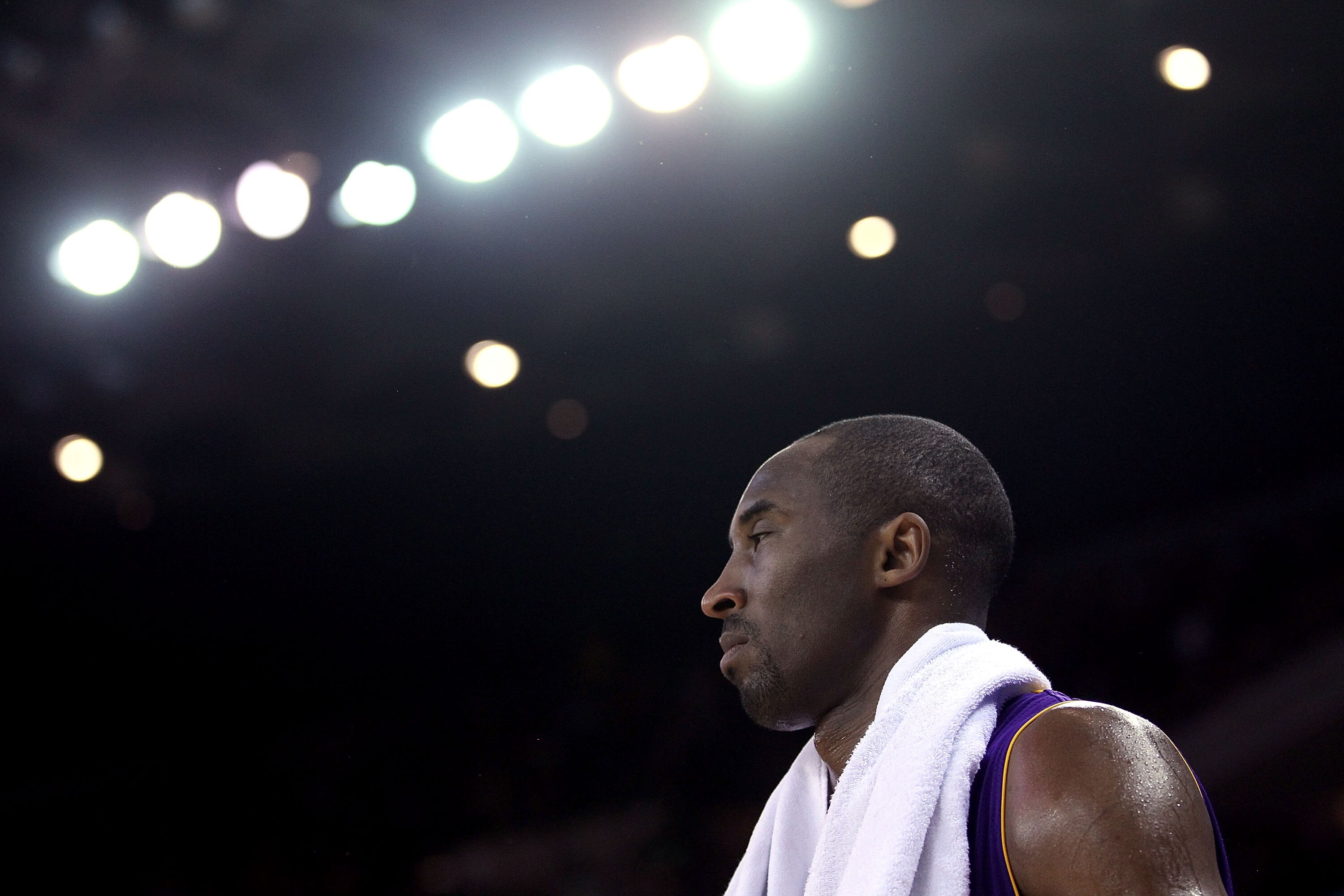 OAKLAND, CA - JANUARY 12:  Kobe Bryant #24 of the Los Angeles Lakers stands by the bench during their game against the Golden State Warriors at Oracle Arena on January 12, 2011 in Oakland, California. NOTE TO USER: User expressly acknowledges and agrees t
