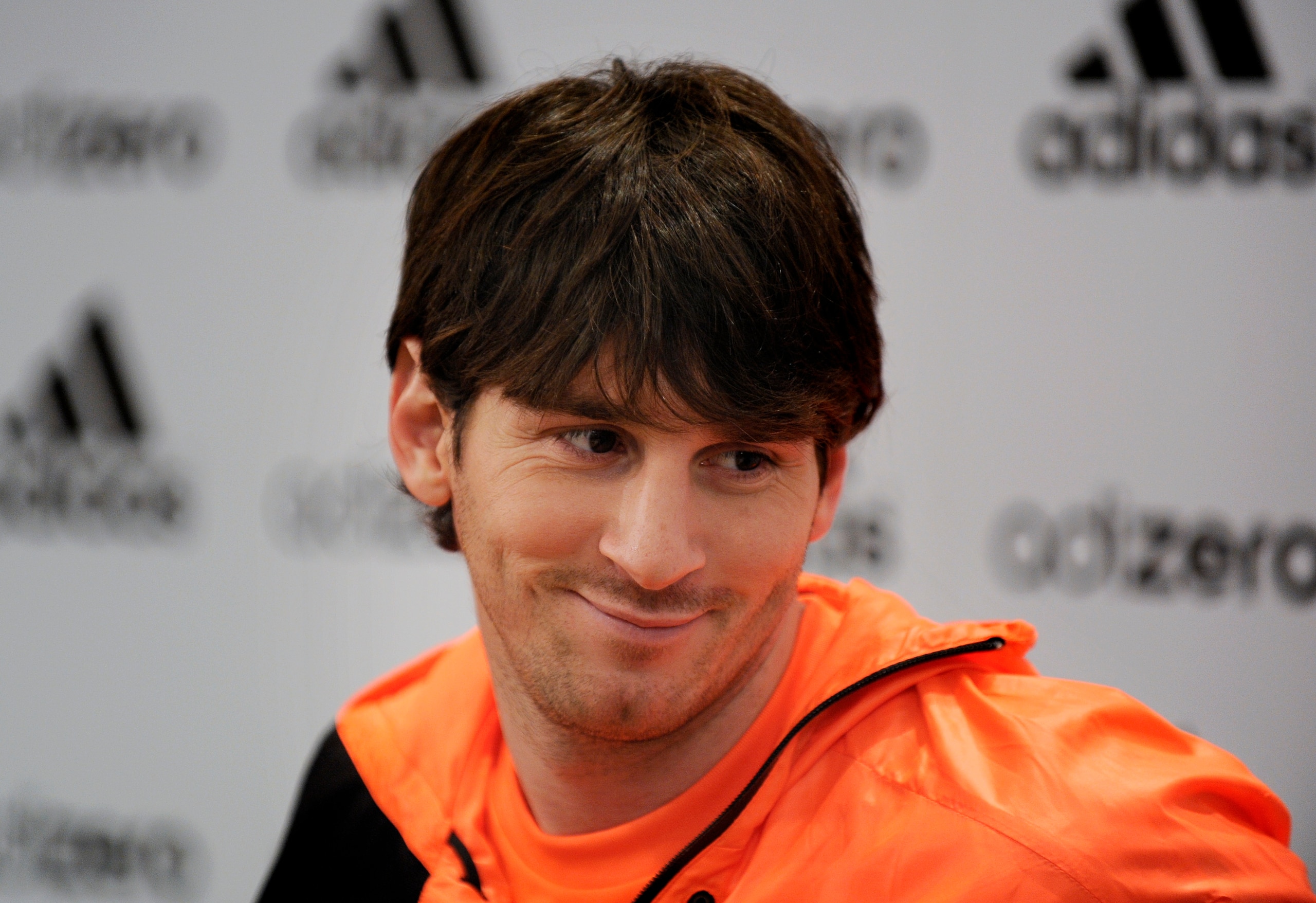BARCELONA, SPAIN - JANUARY 13: Lionel Messi attends a press conference during the launch of the new adiZero footwear range from adidas on January 13, 2011 in Barcelona, Spain. (Photo by David Ramos/Getty Images for adidas) BARCELONA, SPAIN - JANUARY 13: Lionel Messi attends a press conference during the launch of the new adiZero footwear range from adidas on January 13, 2011 in Barcelona, Spain. (Photo by David Ramos/Getty Images for adidas)