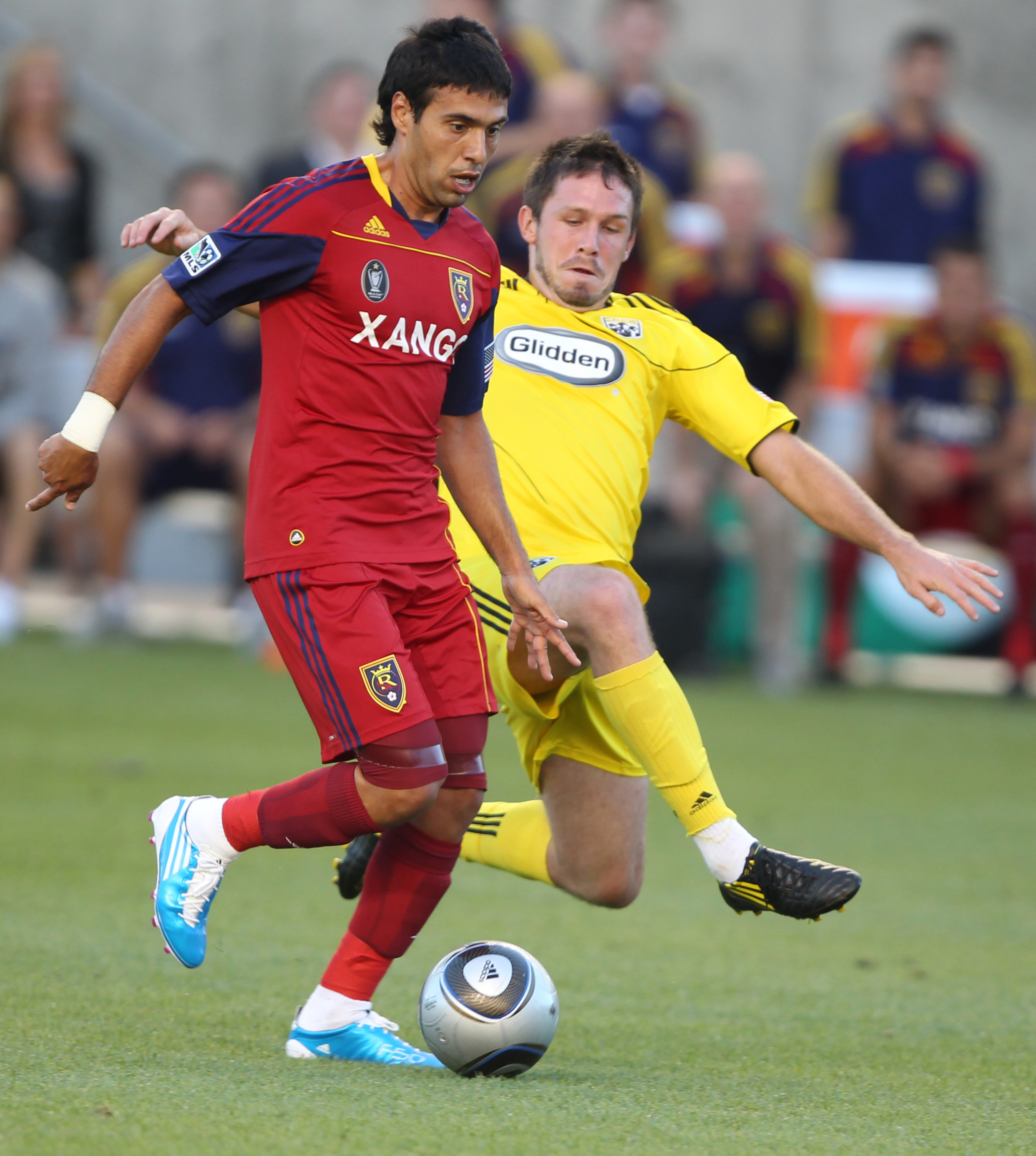 SANDY, UT - AUGUST 14: Javier Morales #11 of Real Salt Lake is chased by Danny O'Rourke #5 of the Columbus Crew during the first half of an MLS soccer game August 14, 2010 at Rio Tinto Stadium in Sandy, Utah. (Photo by George Frey/Getty Images)