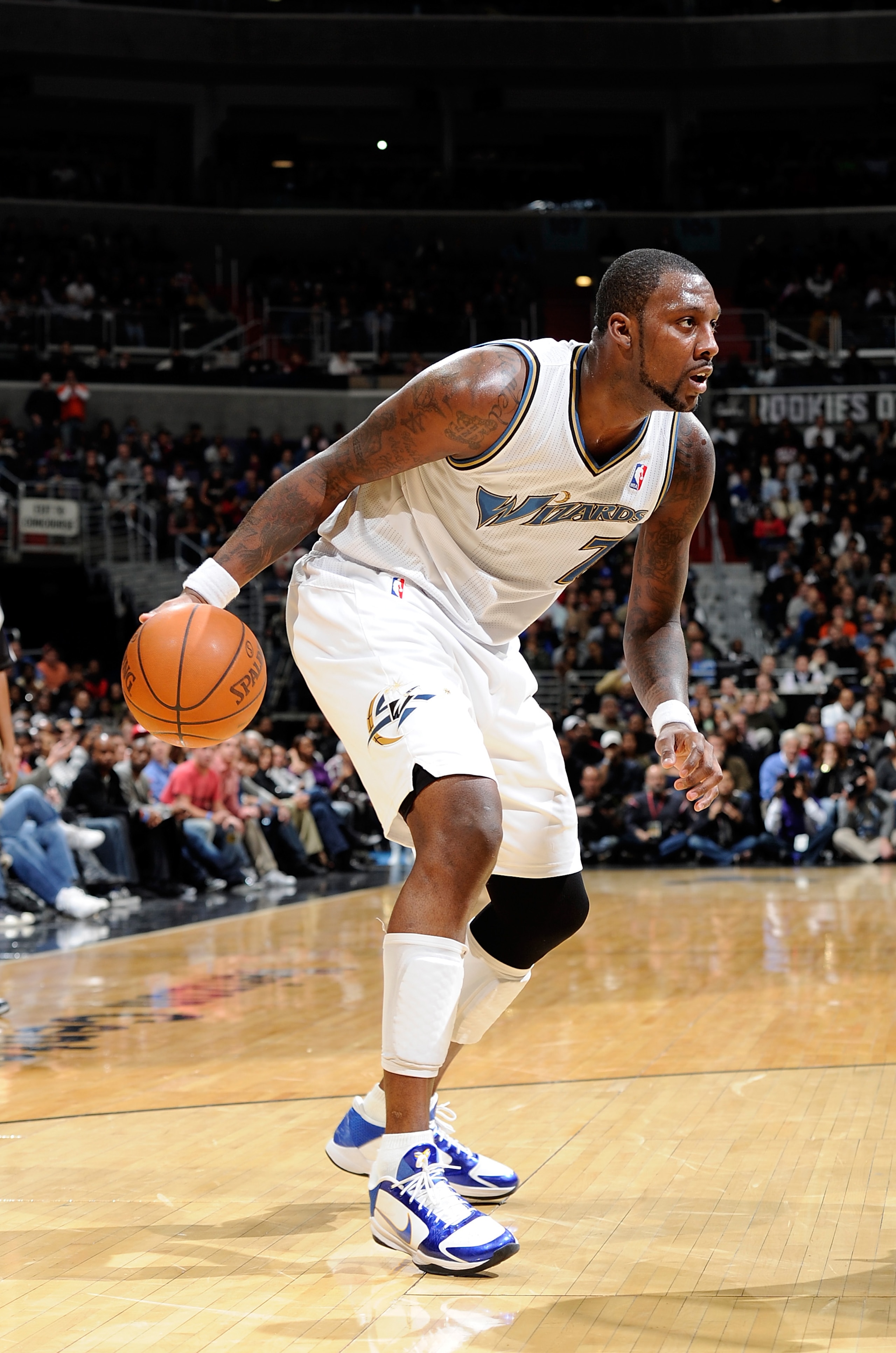 WASHINGTON, DC - DECEMBER 18:  Andray Blatche #7 of the Washington Wizards handles the ball against the Miami Heat at the Verizon Center on December 18, 2010 in Washington, DC. NOTE TO USER: User expressly acknowledges and agrees that, by downloading and