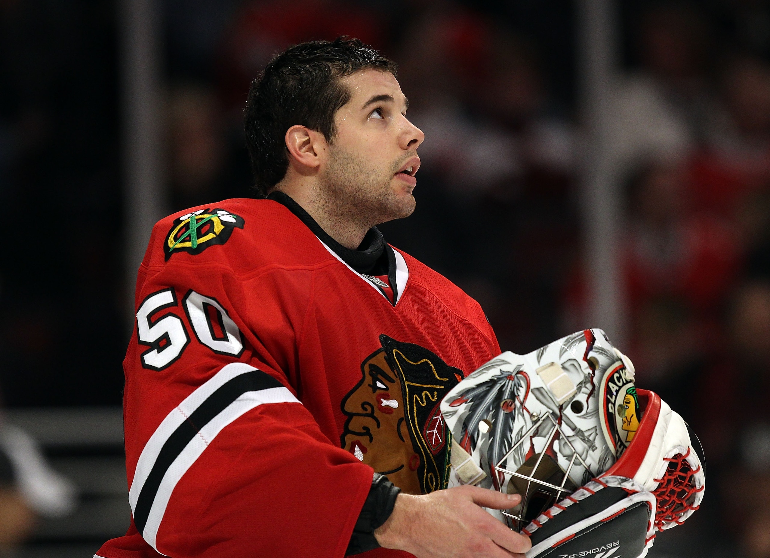 CHICAGO, IL - DECEMBER 17: Corey Crawford #50 of the Chicago Blackhawks watches the replay board during a break in the action against the Detroit Red Wings at the United Center on December 17, 2010 in Chicago, Illinois.  The Blackhawks defeated the Red Wi