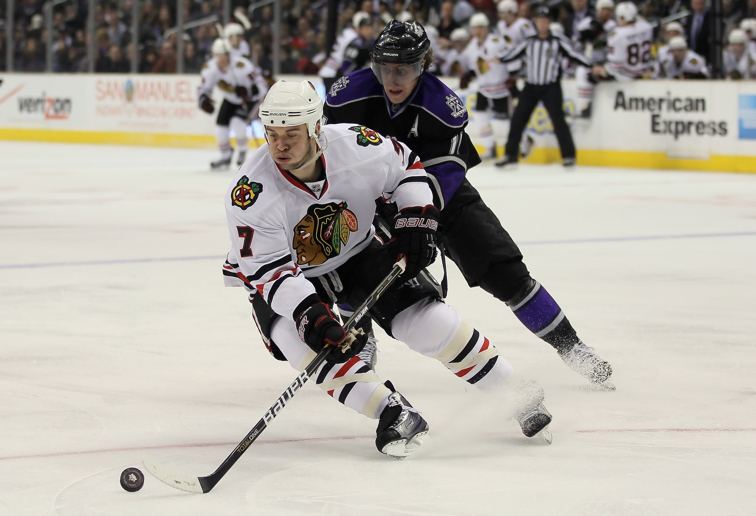 LOS ANGELES, CA - JANUARY 03:  Brent Seabrook #7 of the Chicago Blackhawks is pursued by Anze Kopitar #11 of the Los Angeles Kings in the second period at Staples Center on January 3, 2011 in Los Angeles, California. The Blackhawks defeated the Kings 4-3.