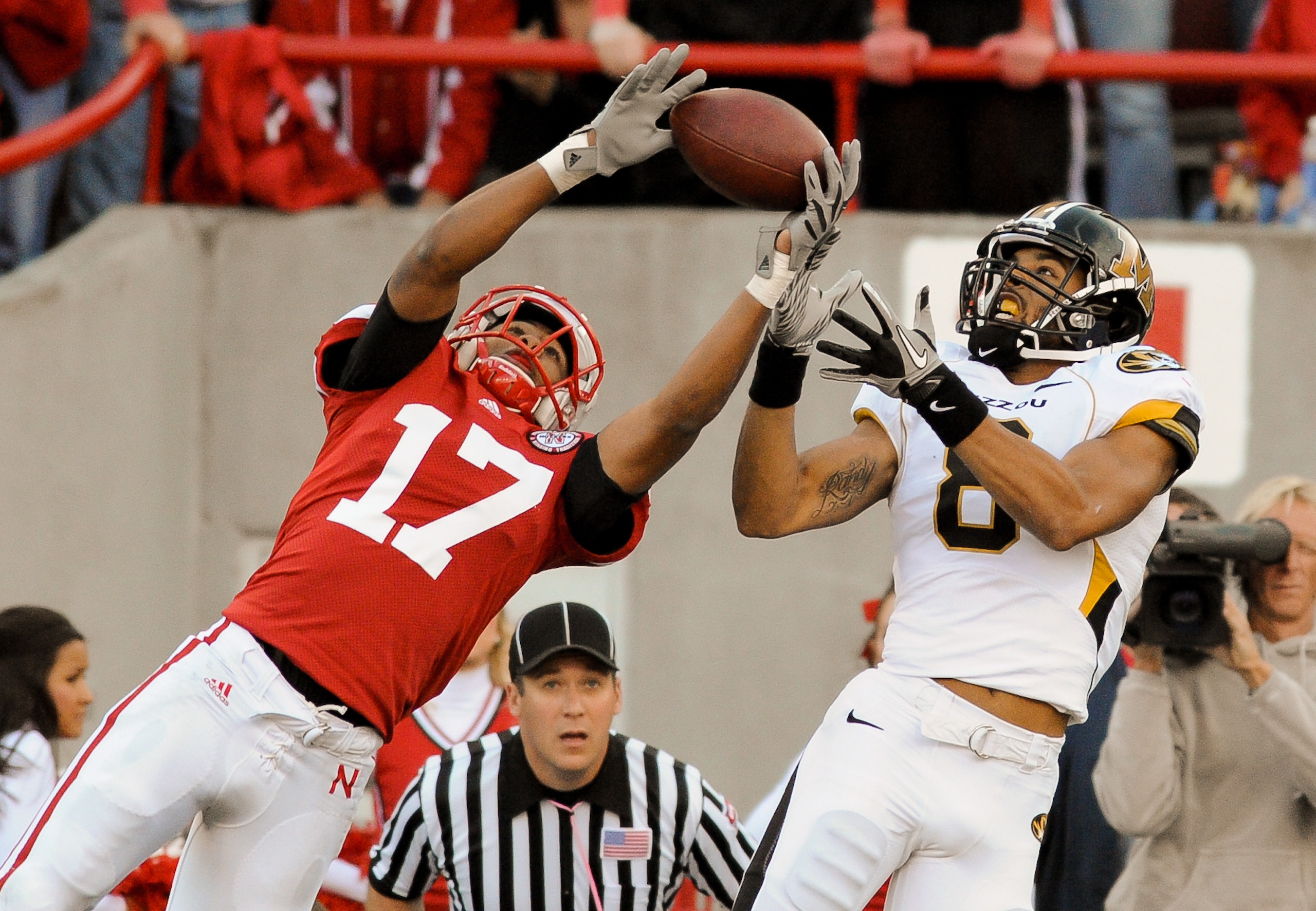 LINCOLN, NE - OCTOBER 30: Defensive back Ciante Evans #17 of the Nebraska Cornhuskers breaks up a intended for wide receiver Wes Kemp #8 of the Missouri Tigers during second half action of their game at Memorial Stadium on October 30, 2010 in Lincoln, Neb LINCOLN, NE - OCTOBER 30: Defensive back Ciante Evans #17 of the Nebraska Cornhuskers breaks up a intended for wide receiver Wes Kemp #8 of the Missouri Tigers during second half action of their game at Memorial Stadium on October 30, 2010 in Lincoln, Neb