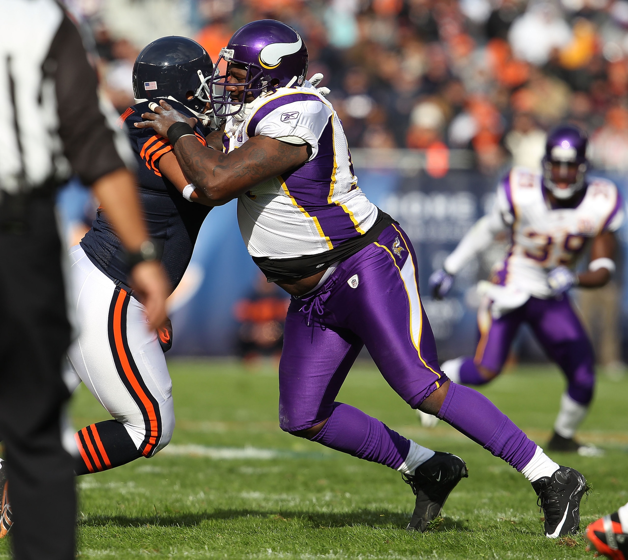 CHICAGO - NOVEMBER 14: Pat Williams #94 of the Minnesota Vikings works against Brandon Manumaleuna #86 of the Chicago Bears at Soldier Field on November 14, 2010 in Chicago, Illinois. The Bears defeated the Vikings 27-13. (Photo by Jonathan Daniel/Getty I