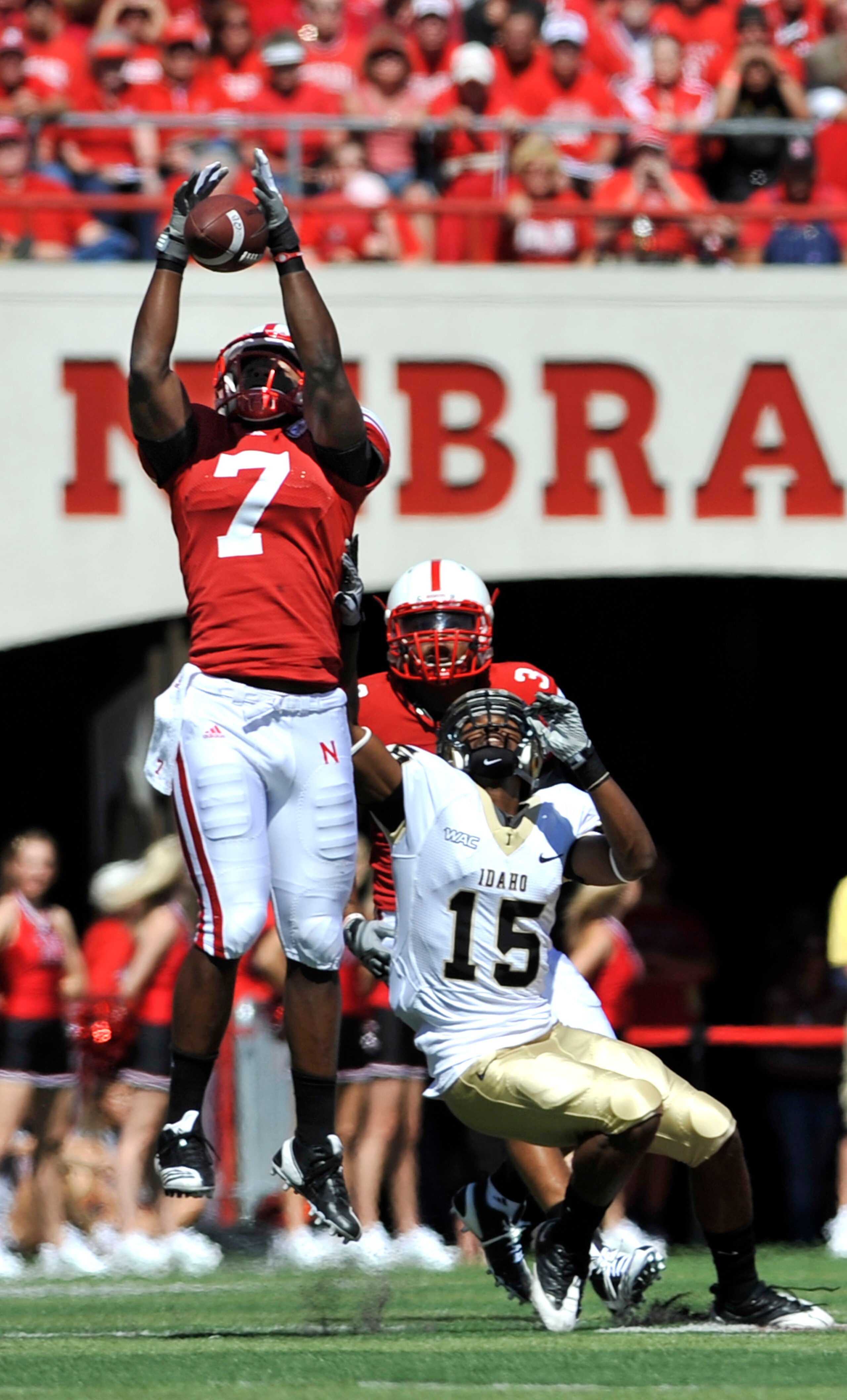 LINCOLN, NEBRASKA - SEPTEMBER 11: Nebraska Cornhuskers defensive back DeJon Gomes #7 and safety Rickey Thenarse #3 knock a pass away from Idaho Vandals wide receiver Marsel Posey #15 during first half action of their game at Memorial Stadium on September LINCOLN, NEBRASKA - SEPTEMBER 11: Nebraska Cornhuskers defensive back DeJon Gomes #7 and safety Rickey Thenarse #3 knock a pass away from Idaho Vandals wide receiver Marsel Posey #15 during first half action of their game at Memorial Stadium on September