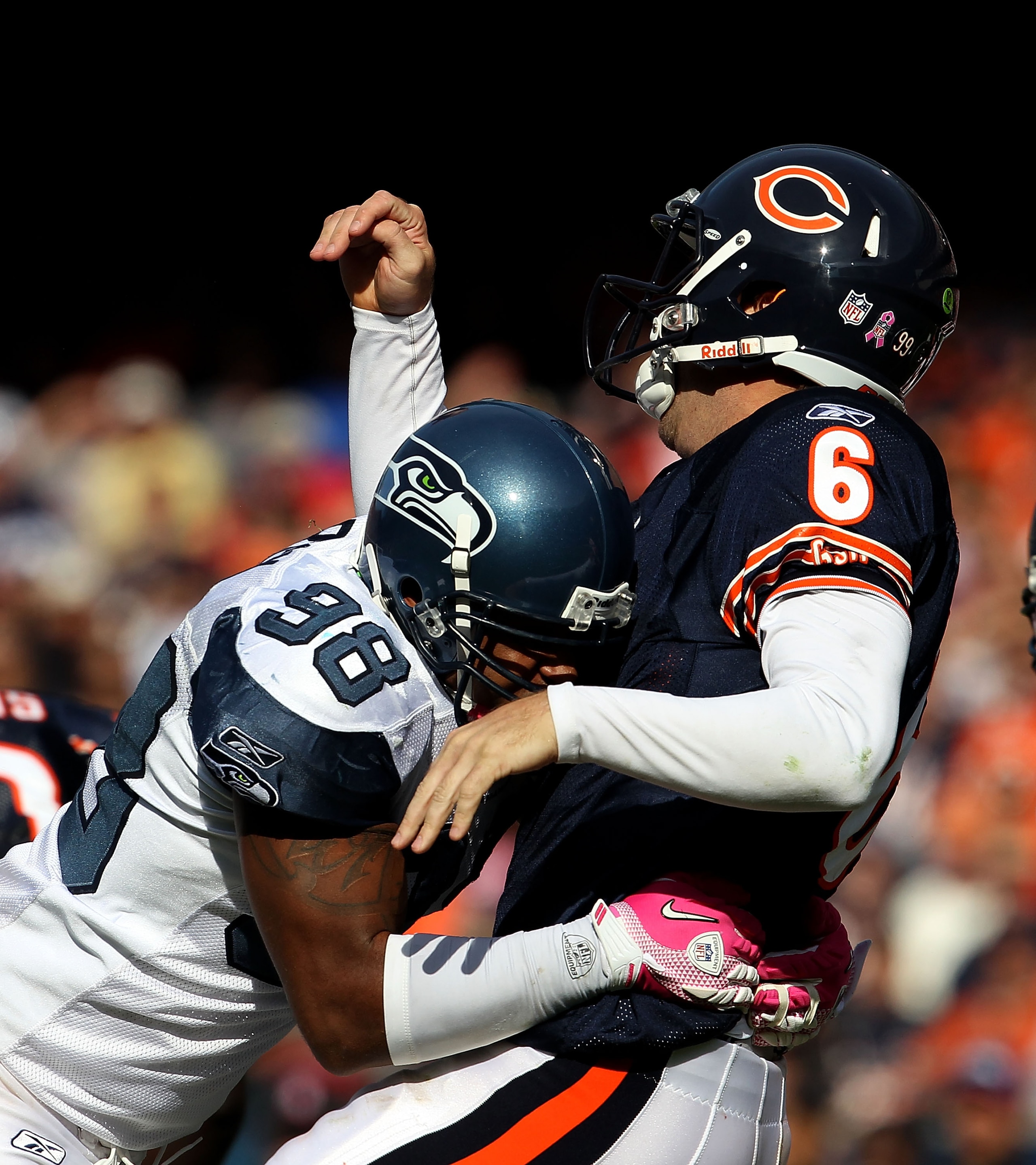 CHICAGO - OCTOBER 17: Jay Cutler #6 of the Chicago Bears is hit after throwing by Raheem Brock #98 of the Seattle Seahawks at Soldier Field on October 17, 2010 in Chicago, Illinois. The Seahawks defeated the Bears 23-20. (Photo by Jonathan Daniel/Getty Im