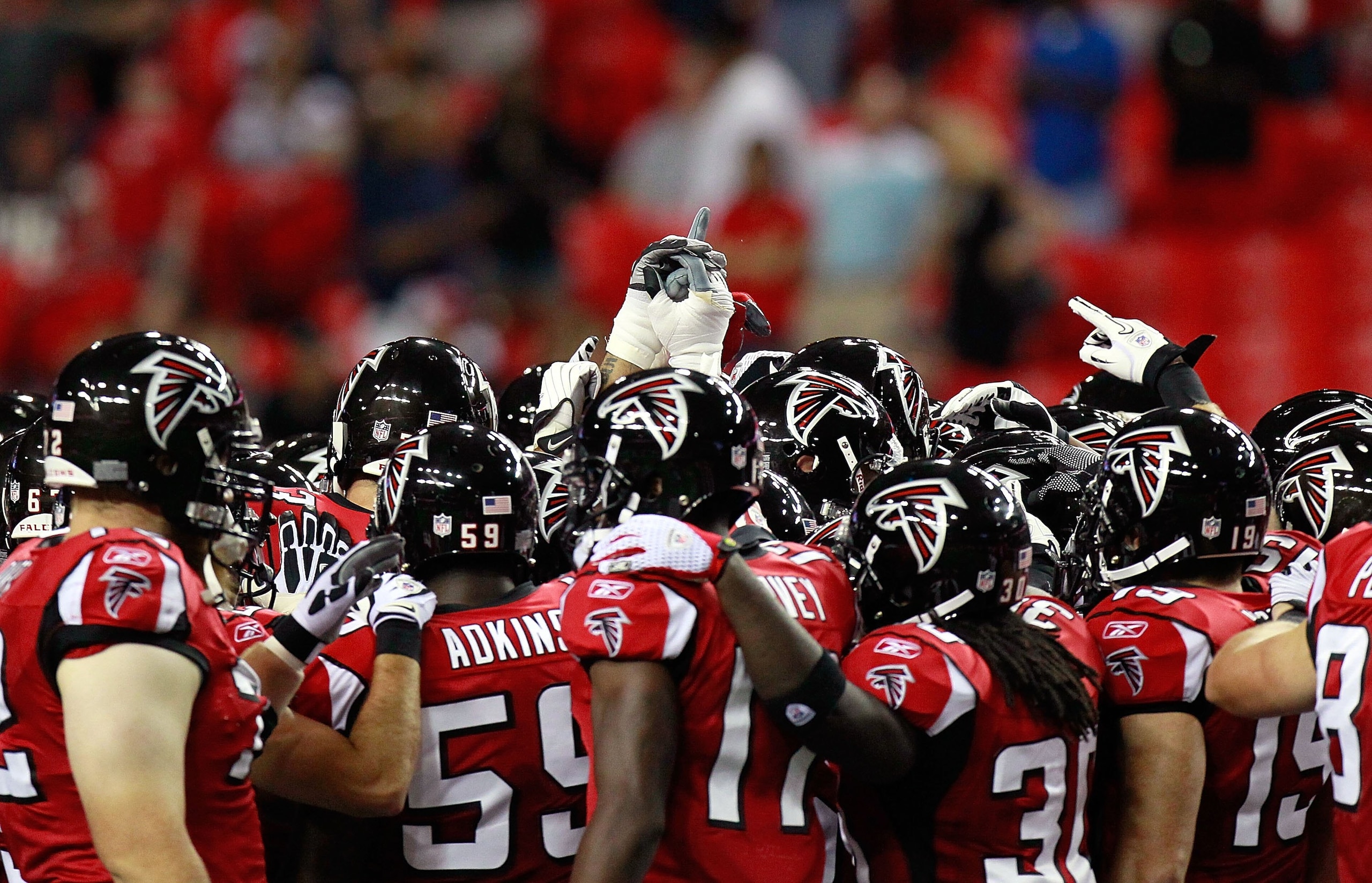 ATLANTA - AUGUST 13:  The Atlanta Falcons huddle before facing the Kansas City Chiefs at Georgia Dome on August 13, 2010 in Atlanta, Georgia.  (Photo by Kevin C. Cox/Getty Images)