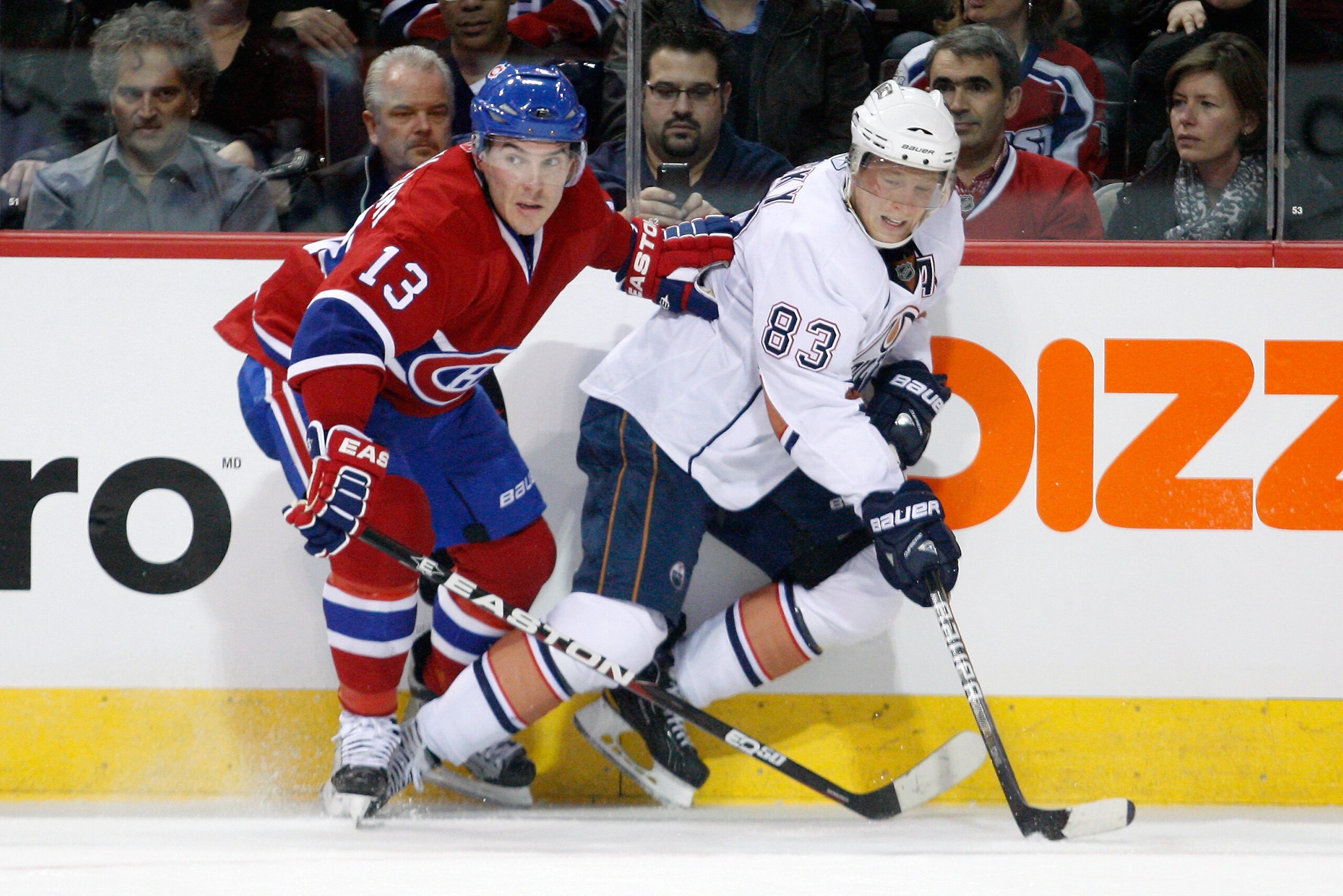MONTREAL, CANADA - DECEMBER 01:  Mike Cammalleri #13 of the Montreal Canadiens and Ales Hemsky #83 of the Edmonton Oilers battle for position during the NHL game at the Bell Centre on December 1, 2010 in Montreal, Quebec, Canada.  The Oilers defeated the