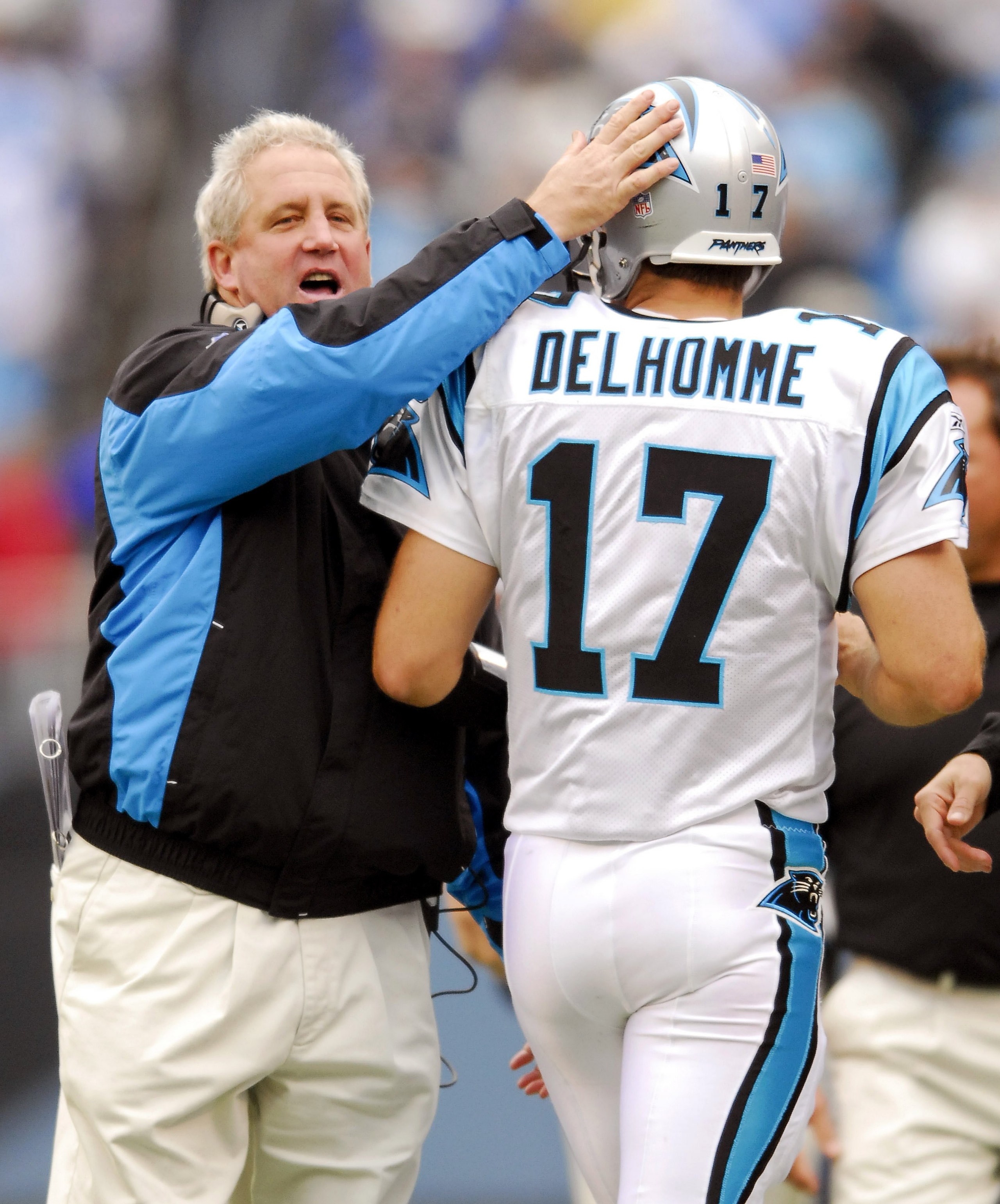 CHARLOTTE, NC - OCTOBER 8: Coach John Fox (L) congratulates quarterback Jake Delhomme #17 of the Carolina Panthers after a touchdown against the Cleveland Browns during the second quarter on October 8, 2006 at Bank of America Stadium in Charlotte, North CHARLOTTE, NC - OCTOBER 8: Coach John Fox (L) congratulates quarterback Jake Delhomme #17 of the Carolina Panthers after a touchdown against the Cleveland Browns during the second quarter on October 8, 2006 at Bank of America Stadium in Charlotte, North