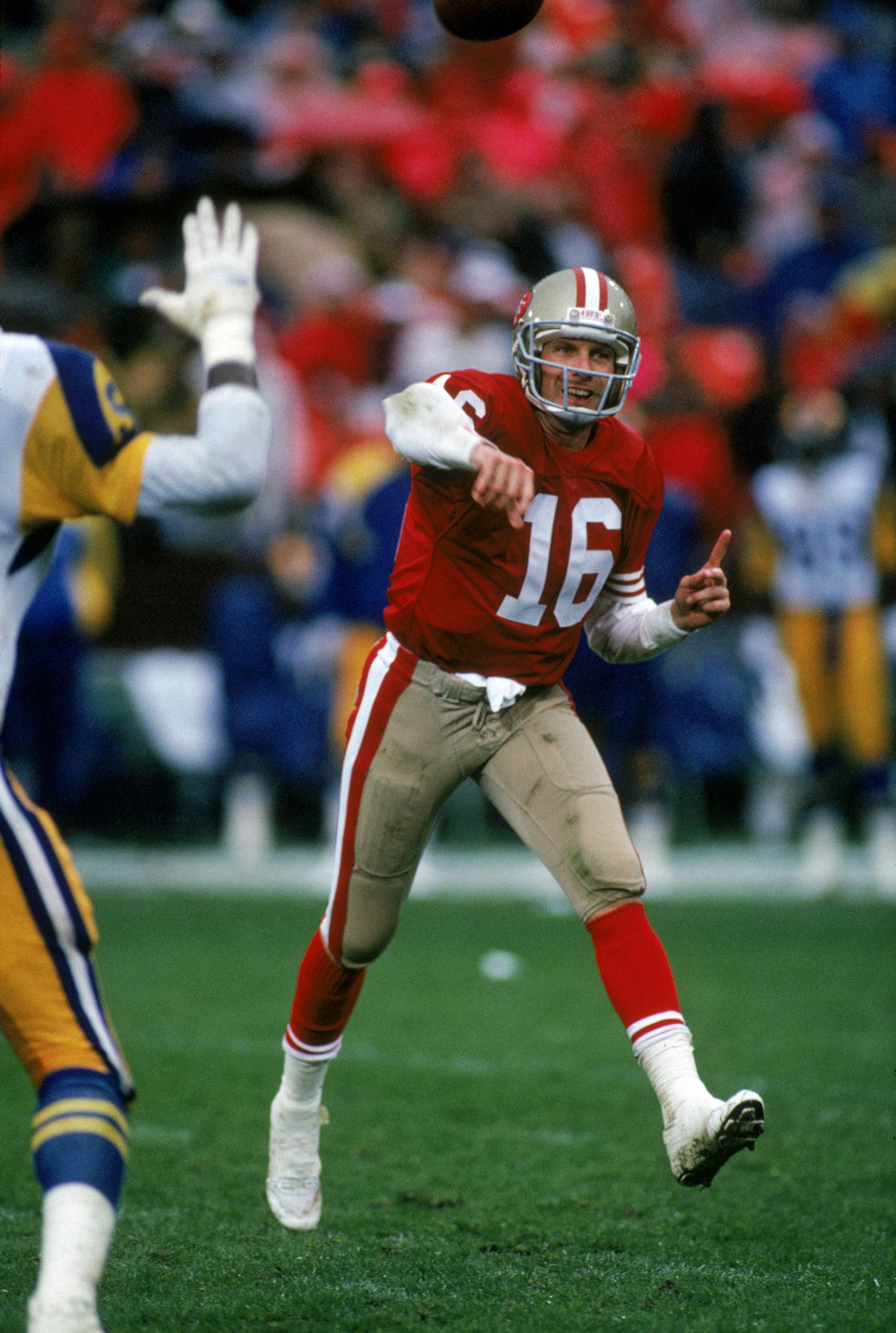 SAN FRANCISCO - NOVEMBER 25: Quarterback Joe Montana #16 of the San Francisco 49ers throws a pass during a game against the Los Angeles Rams at Candlestick Park on November 25, 1990 in San Francisco, California. The Rams won 28-17 keeping their 18 game SAN FRANCISCO - NOVEMBER 25: Quarterback Joe Montana #16 of the San Francisco 49ers throws a pass during a game against the Los Angeles Rams at Candlestick Park on November 25, 1990 in San Francisco, California. The Rams won 28-17 keeping their 18 game