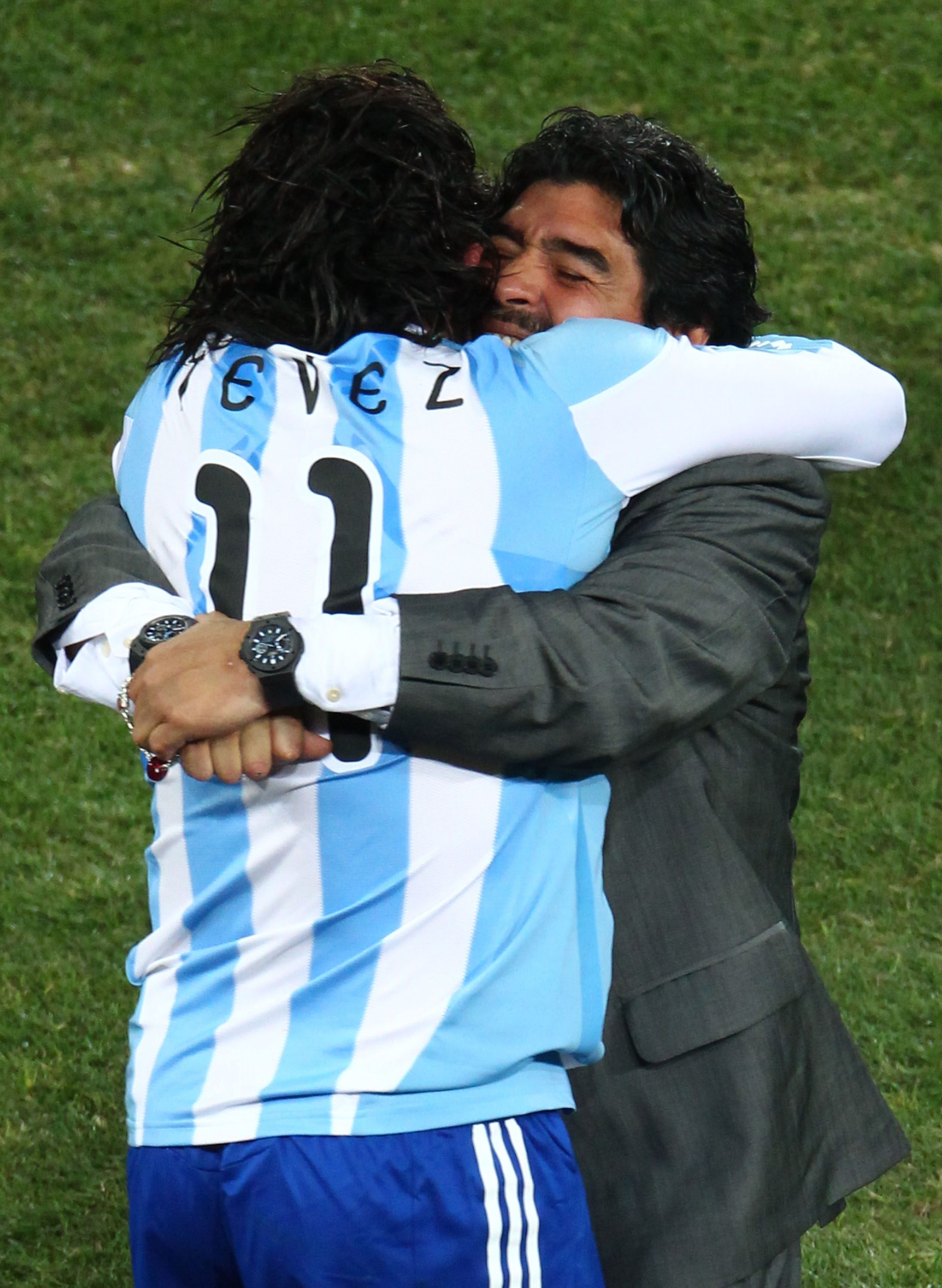 JOHANNESBURG, SOUTH AFRICA - JUNE 27:  Diego Maradona head coach of Argentina congratulates Carlos Tevez after he scored the third goal during the 2010 FIFA World Cup South Africa Round of Sixteen match between Argentina and Mexico at Soccer City Stadium 