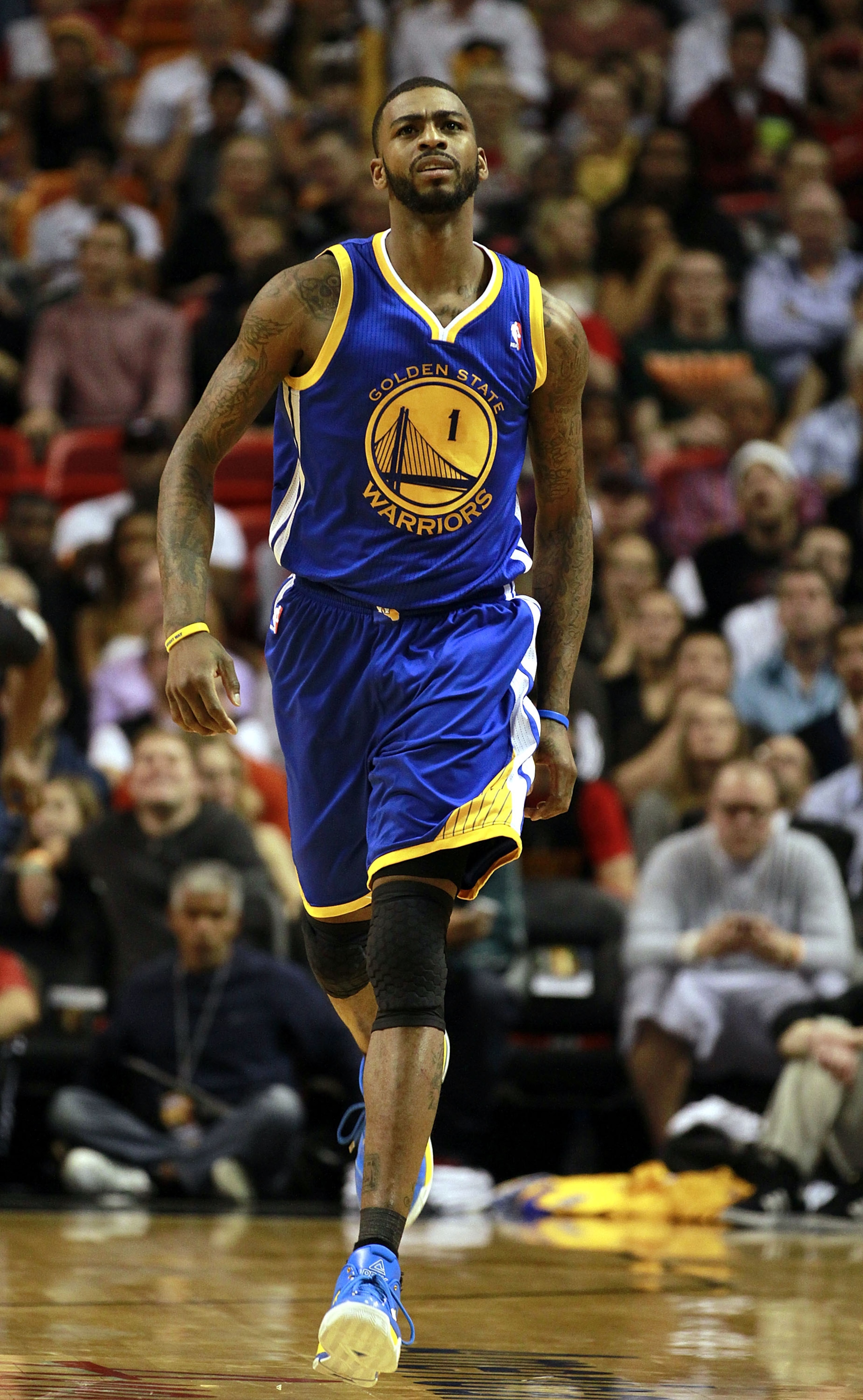 MIAMI - JANUARY 01:   Dorell Wright #1 of the Golden State Warriors runs during the game against the Miami Heat at American Airlines Arena on January 1, 2011 in Miami, Florida.  The Heat won 114-107. NOTE TO USER: User expressly acknowledges and agrees th