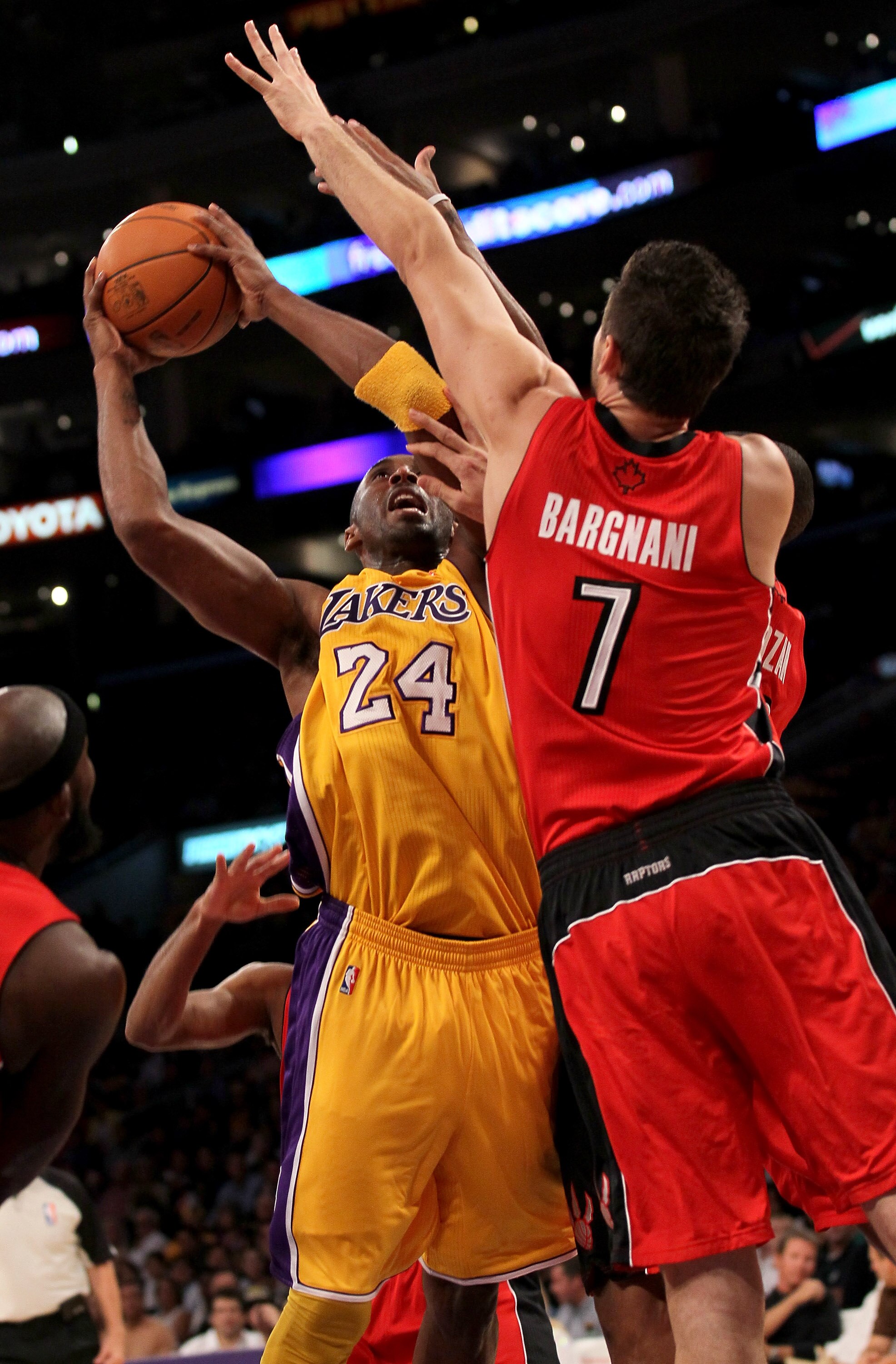 LOS ANGELES, CA - NOVEMBER 05:  Kobe Bryant #24 of the Los Angeles Lakers shoots against Andrea Bargnani #7 of the Toronto Raptors at Staples Center on November 5, 2010 in Los Angeles, California.  The Lakers won 108-102.   NOTE TO USER: User expressly ac