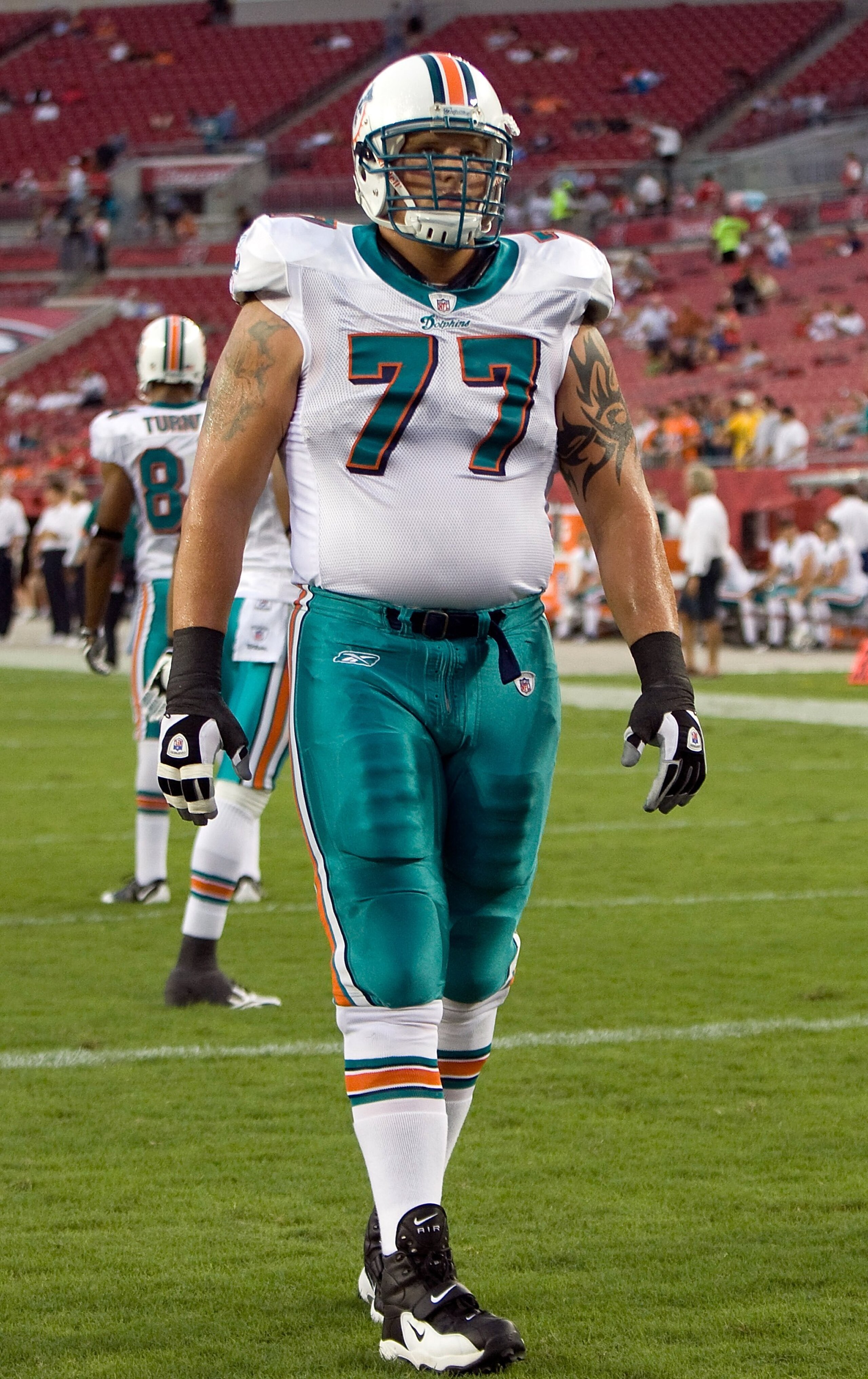TAMPA, FL - AUGUST 27:  Offensive lineman Jake Long #77 of the Miami Dolphins warms up just prior to the start of the game against the Tampa Bay Buccaneers at Raymond James Stadium on August 27, 2009 in Tampa, Florida.  (Photo by J. Meric/Getty Images)