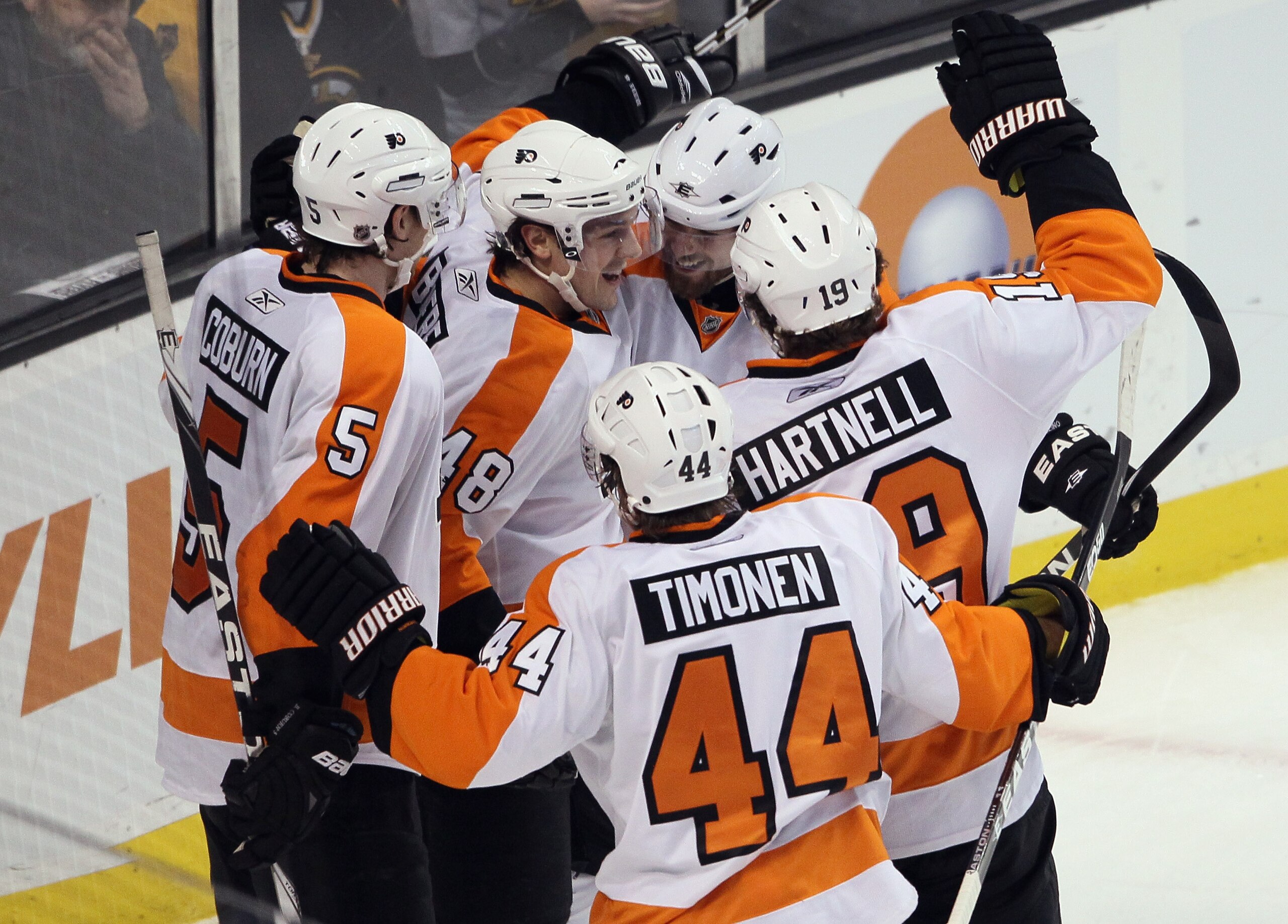 BOSTON, MA - JANUARY 13:  Danny Briere #48 of the Philadelphia Flyers is congratulated by Scott Hartnell #19, Kimmo Timonen #44 and Braydon Coburn #5 after Briere scored in the third period against the Boston Bruins on January 13, 2011 at the TD Garden in