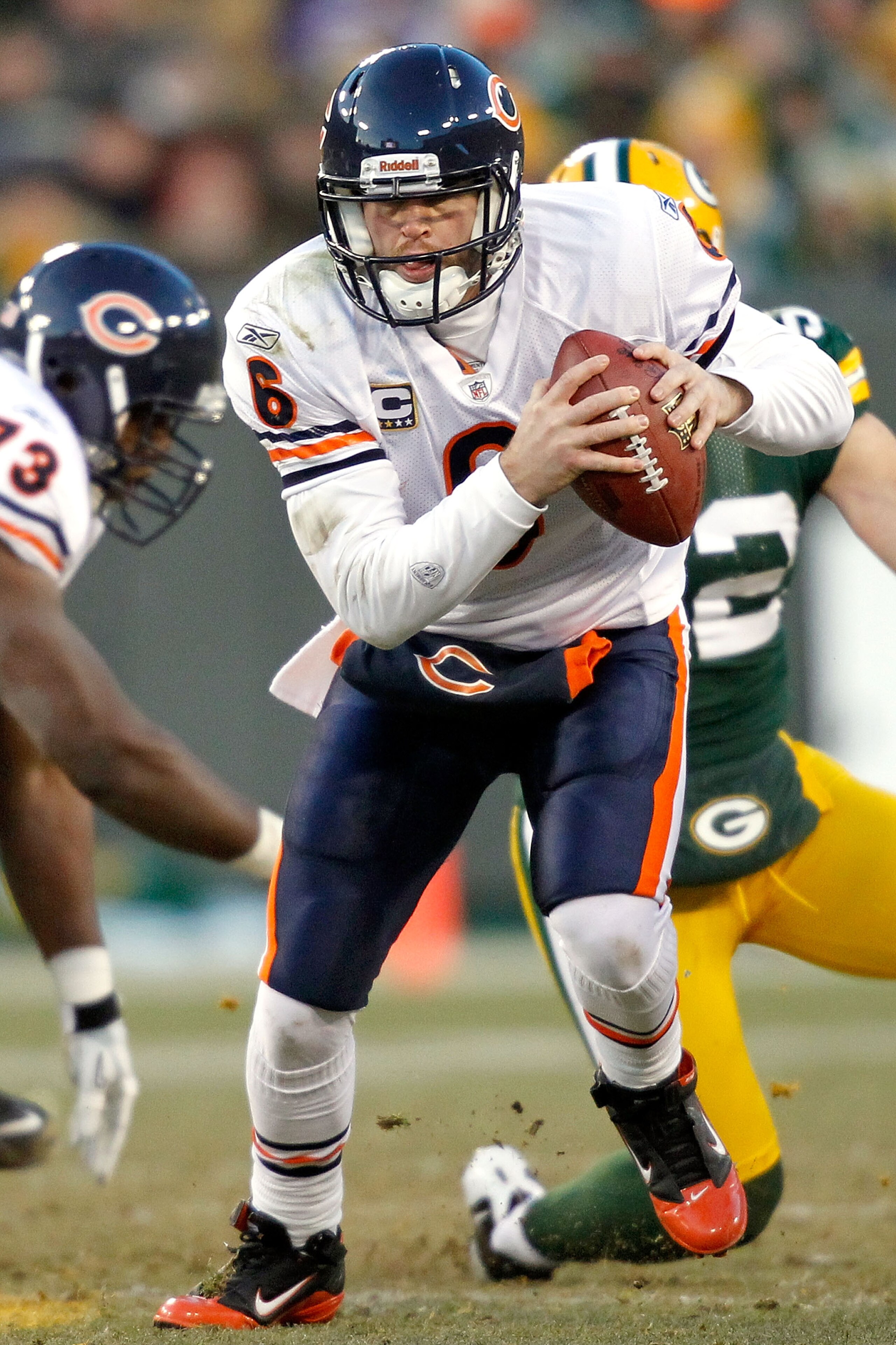 GREEN BAY, WI - JANUARY 02: Quarterback Jay Cutler #6 of the Chicago Bears is chased out of the pocket by the Green Bay Packers at Lambeau Field on January 2, 2011 in Green Bay, Wisconsin. (Photo by Matthew Stockman/Getty Images) GREEN BAY, WI - JANUARY 02: Quarterback Jay Cutler #6 of the Chicago Bears is chased out of the pocket by the Green Bay Packers at Lambeau Field on January 2, 2011 in Green Bay, Wisconsin. (Photo by Matthew Stockman/Getty Images)