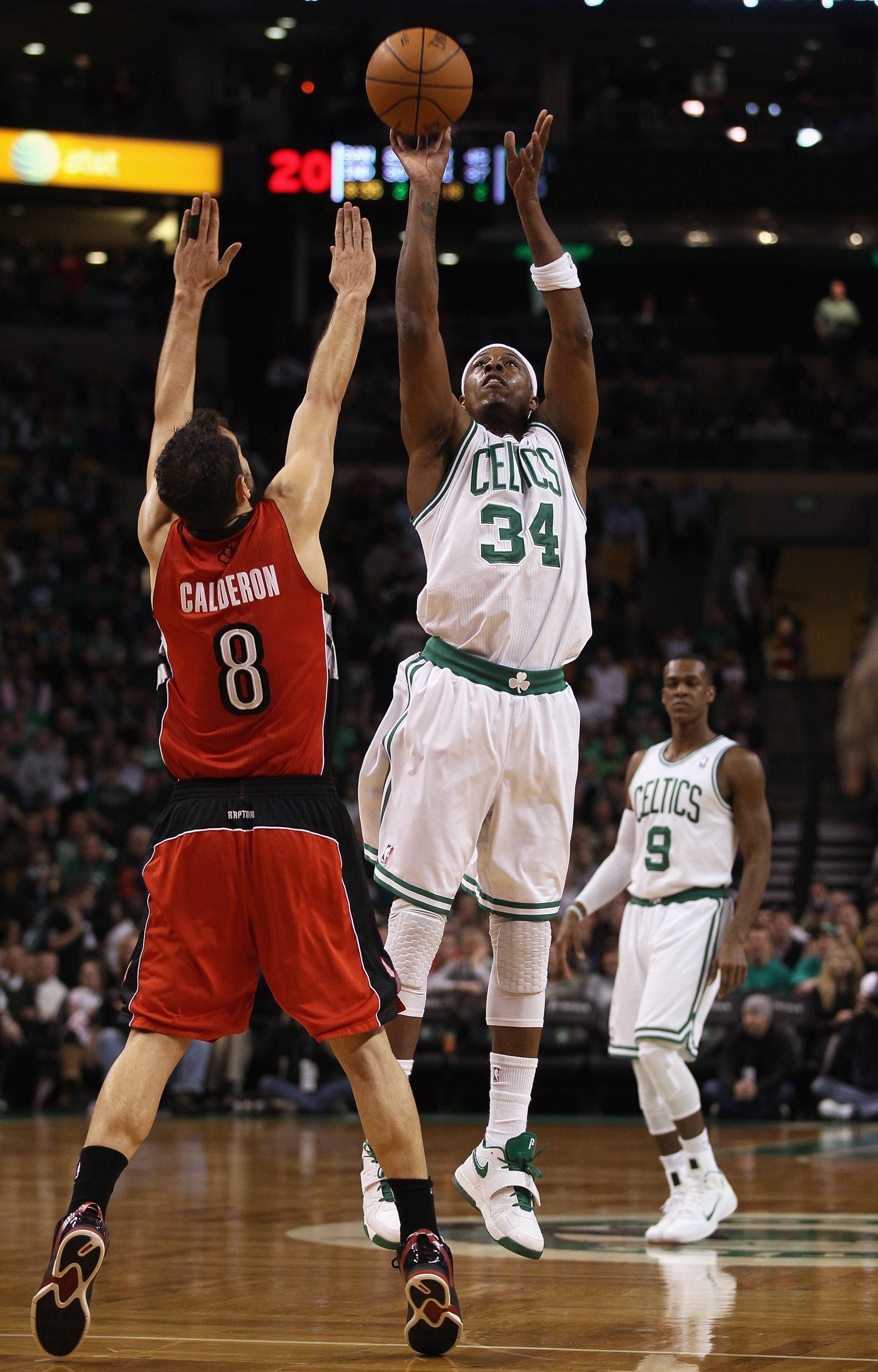 BOSTON, MA - JANUARY 07:  Paul Pierce #34 of the Boston Celtics takes a shot as Jose Calderon #8 of the Toronto Raptors defends on January 7, 2011 at the TD Garden in Boston, Massachusetts. NOTE TO USER: User expressly acknowledges and agrees that, by dow