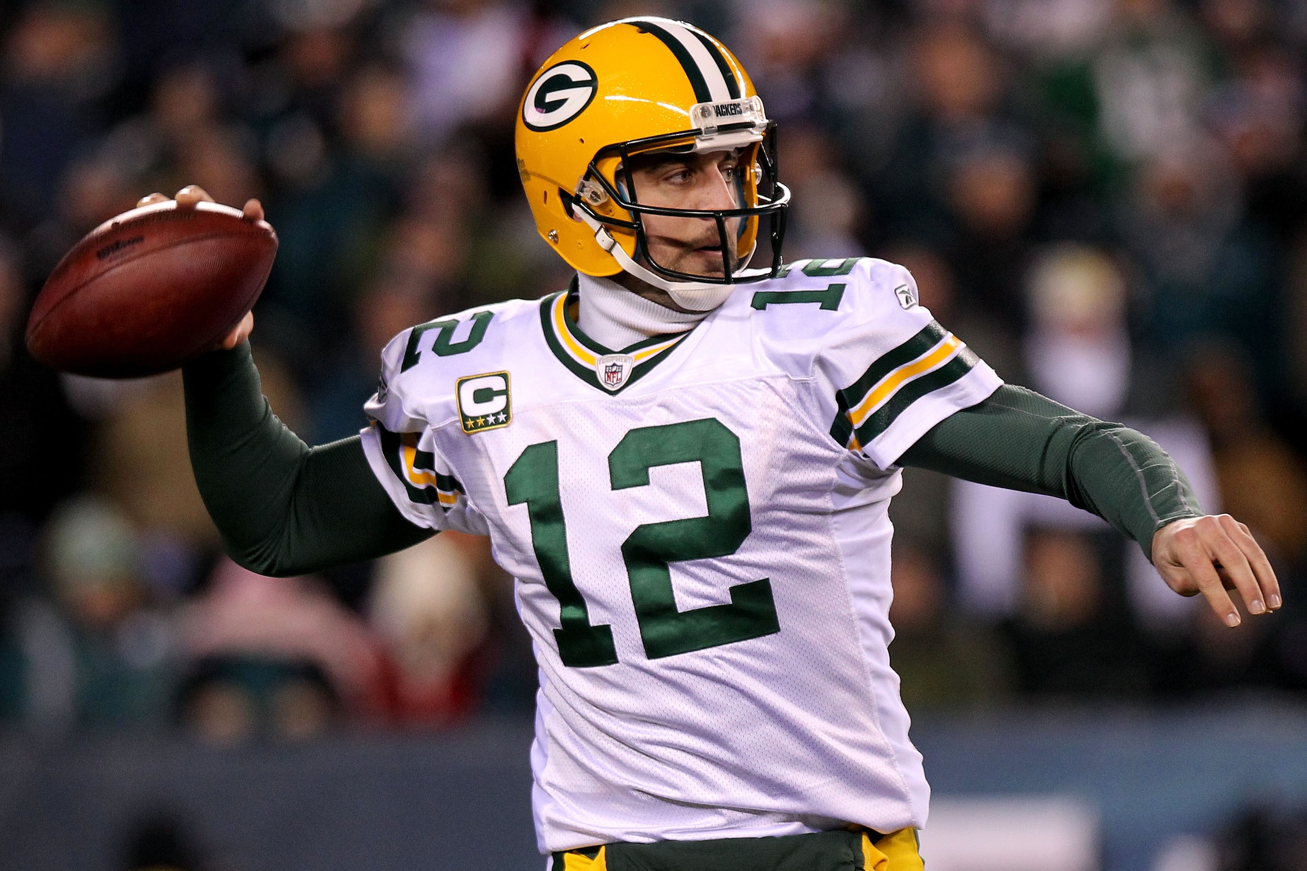 PHILADELPHIA, PA - JANUARY 09:  Aaron Rodgers #12 of the Green Bay Packers prepares to pass against the Philadelphia Eagles during the 2011 NFC wild card playoff game at Lincoln Financial Field on January 9, 2011 in Philadelphia, Pennsylvania.  (Photo by 
