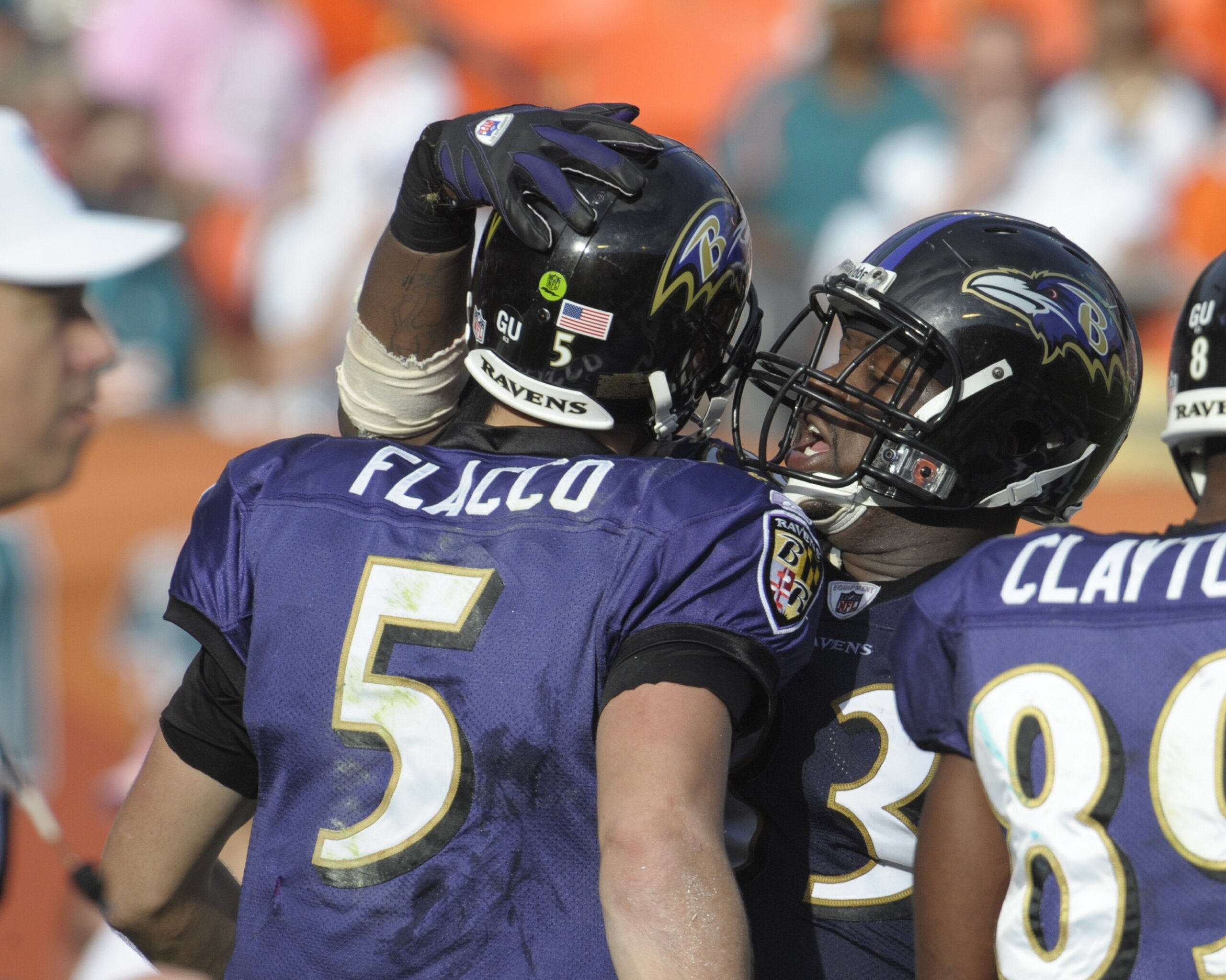 MIAMI, FL - JANUARY 4:  Quarterback Joe Flacco #5 of the Baltimore Ravens celebrates a touchdown against the Miami Dolphins in an NFL Wildcard Playoff Game at Dolphins Stadium on January 4, 2009 in Miami, Florida.  (Photo by Al Messerschmidt/Getty Images)