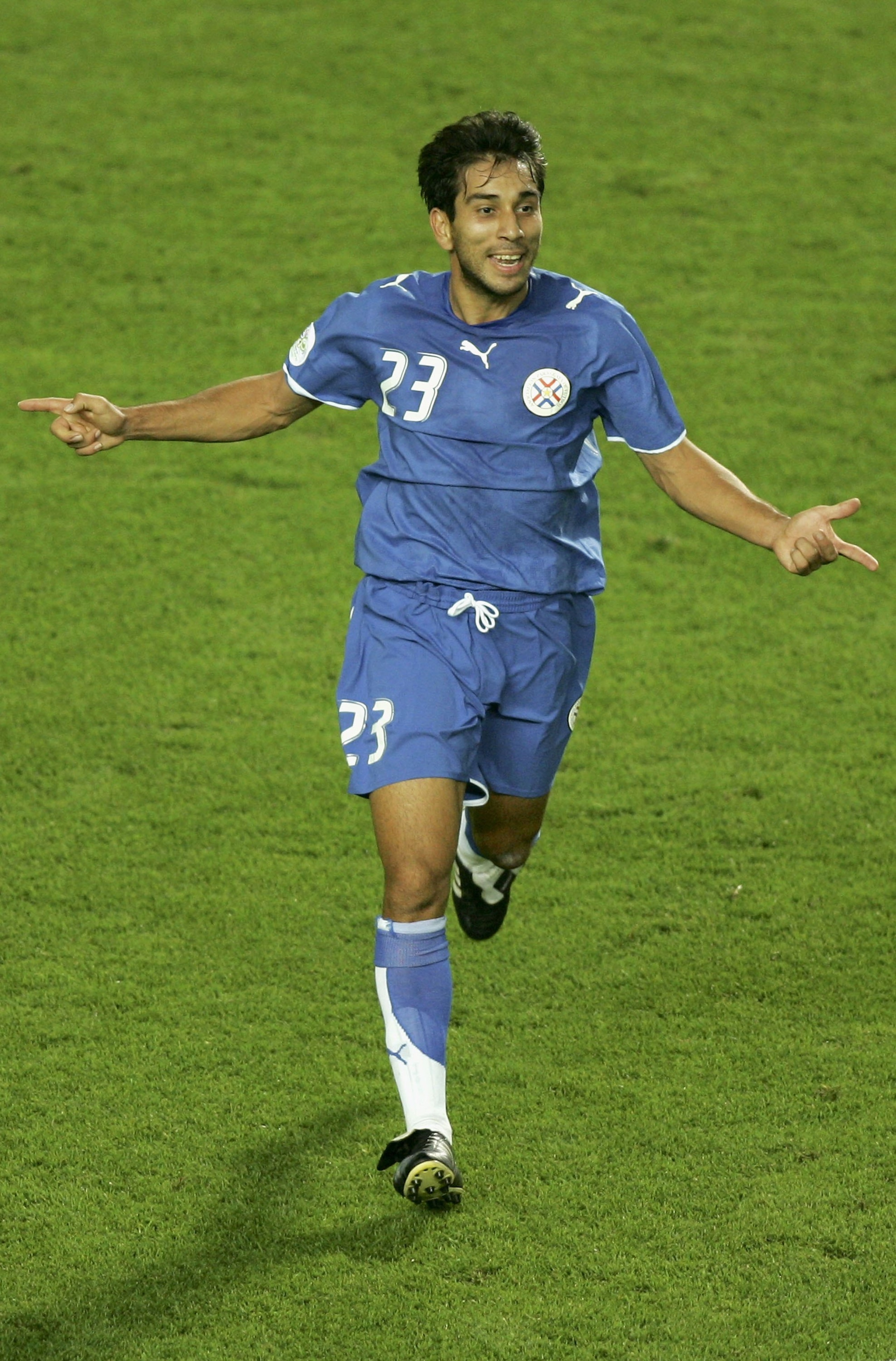 KAISERSLAUTERN, GERMANY - JUNE 20:  Nelson Cuevas of Paraguay celebrates after scoring his team's second goal during the FIFA World Cup Germany 2006 Group B match between Paraguay and Trinidad and Tobago at the Fritz-Walter Stadium on June 20, 2006 in Kai
