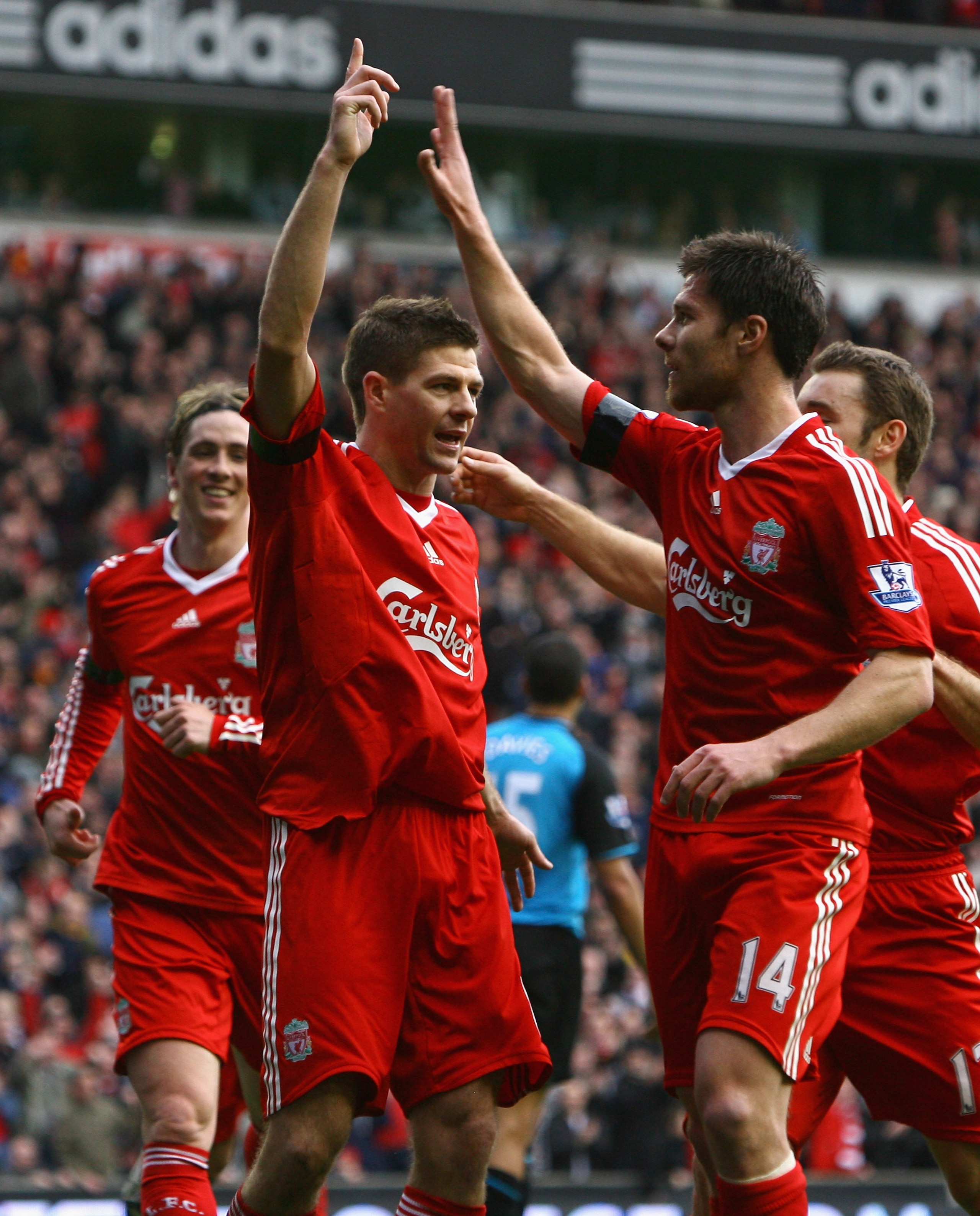 LIVERPOOL, UNITED KINGDOM - MARCH 22:  Steven Gerrard of Liverpool celebrates with his team mates after scoring his team's third goal during the Barclays Premier League match between Liverpool and Aston Villa at Anfield on March 22, 2009 in Liverpool, Eng