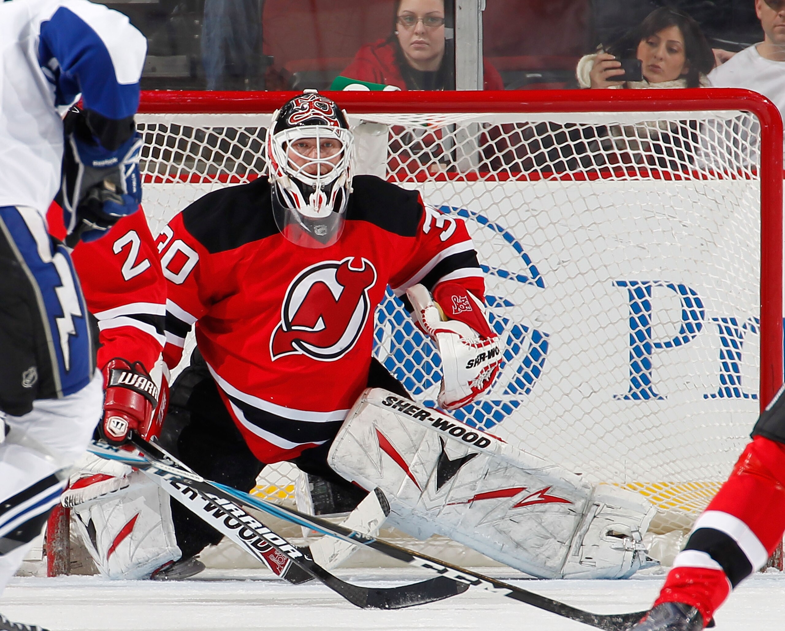 NEWARK, NJ - JANUARY 09:  Goalie Martin Brodeur #30 of the New Jersey Devils awaits a shot during an NHL hockey game against the Tampa Bay Lightning at the Prudential Center on January 9, 2011 in Newark, New Jersey.  (Photo by Paul Bereswill/Getty Images)