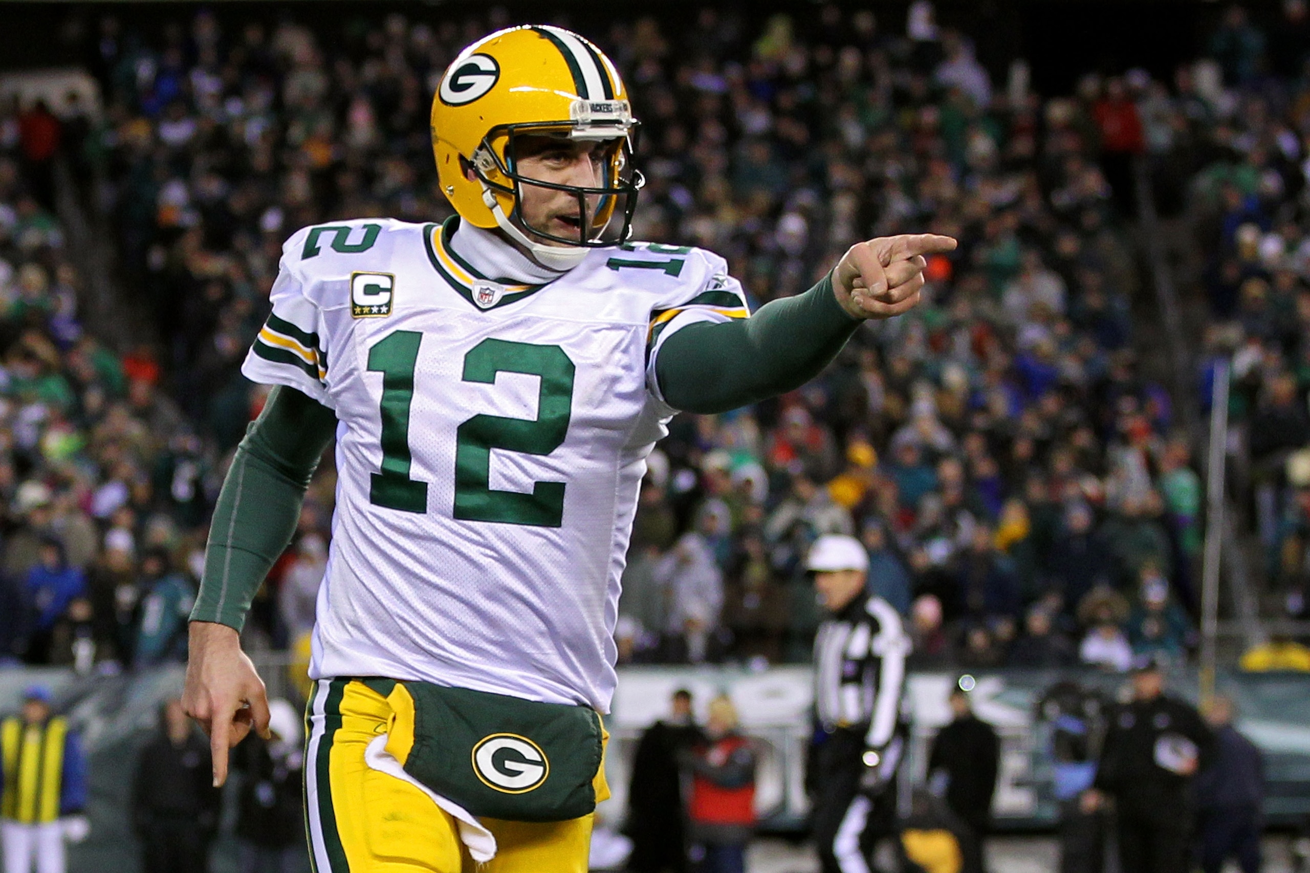 PHILADELPHIA, PA - JANUARY 09: Aaron Rodgers #12 of the Green Bay Packers celebrates after a touchdown in the third quarter against the Philadelphia Eagles during the 2011 NFC wild card playoff game at Lincoln Financial Field on January 9, 2011 in Philad PHILADELPHIA, PA - JANUARY 09: Aaron Rodgers #12 of the Green Bay Packers celebrates after a touchdown in the third quarter against the Philadelphia Eagles during the 2011 NFC wild card playoff game at Lincoln Financial Field on January 9, 2011 in Philad
