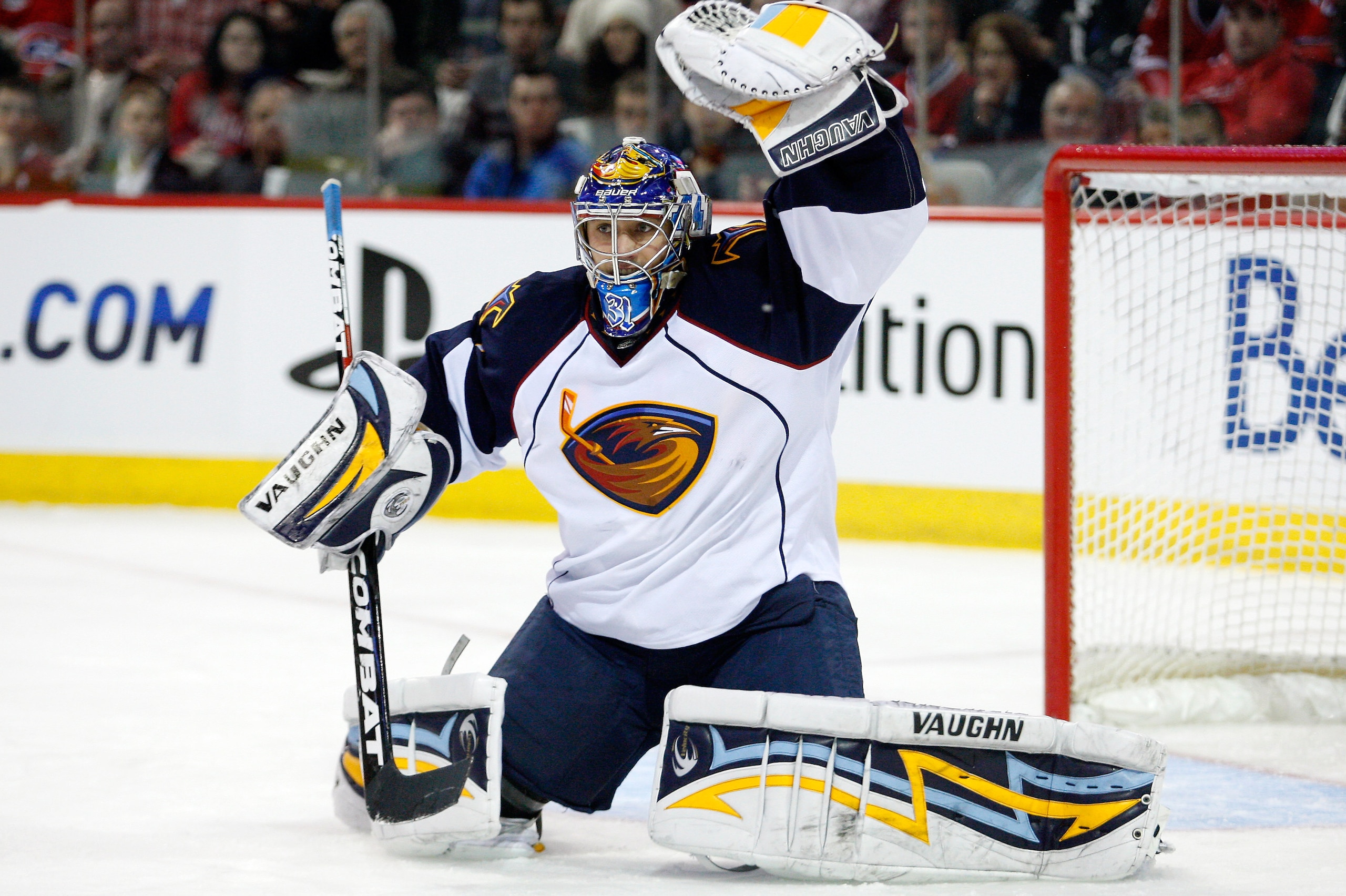 MONTREAL, CANADA - JANUARY 2:  Ondrej Pavelec #31 of the Atlanta Thrashers makes a glove save on the puck during the NHL game against the Montreal Canadiens at the Bell Centre on January 2, 2011 in Montreal, Quebec, Canada.  (Photo by Richard Wolowicz/Get