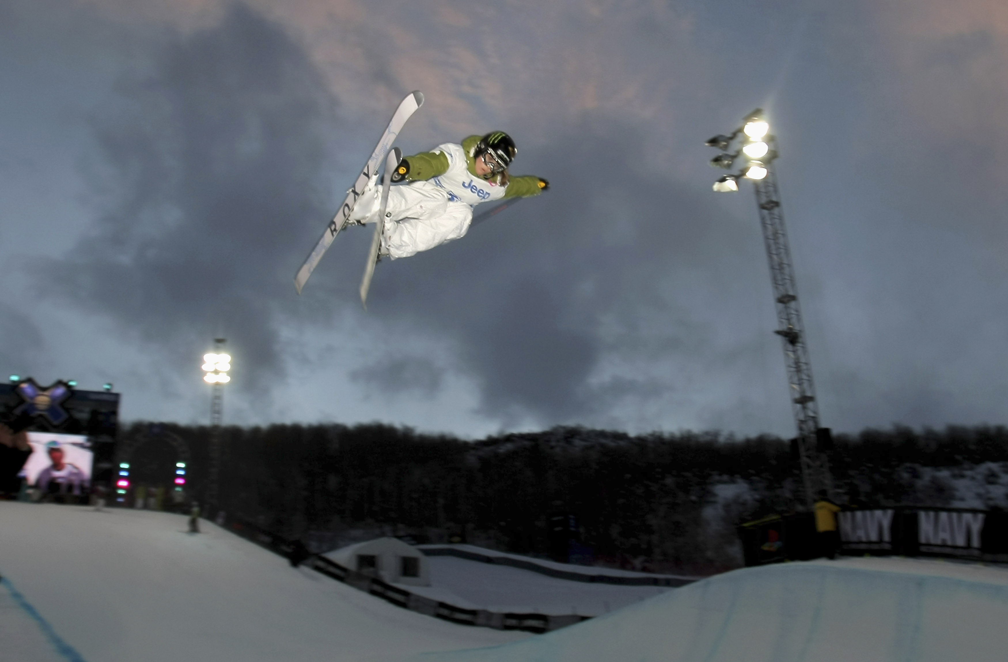 ASPEN, CO - JANUARY 25:  Sarah Burke of Whistler, BC, Canada takes a practice run before going on to win the Women's Skiing Superpipe at the Winter X Games Twelve on Buttermilk Mountain on January 25, 2008 in Aspen, Colorado.  (Photo by Doug Pensinger/Get