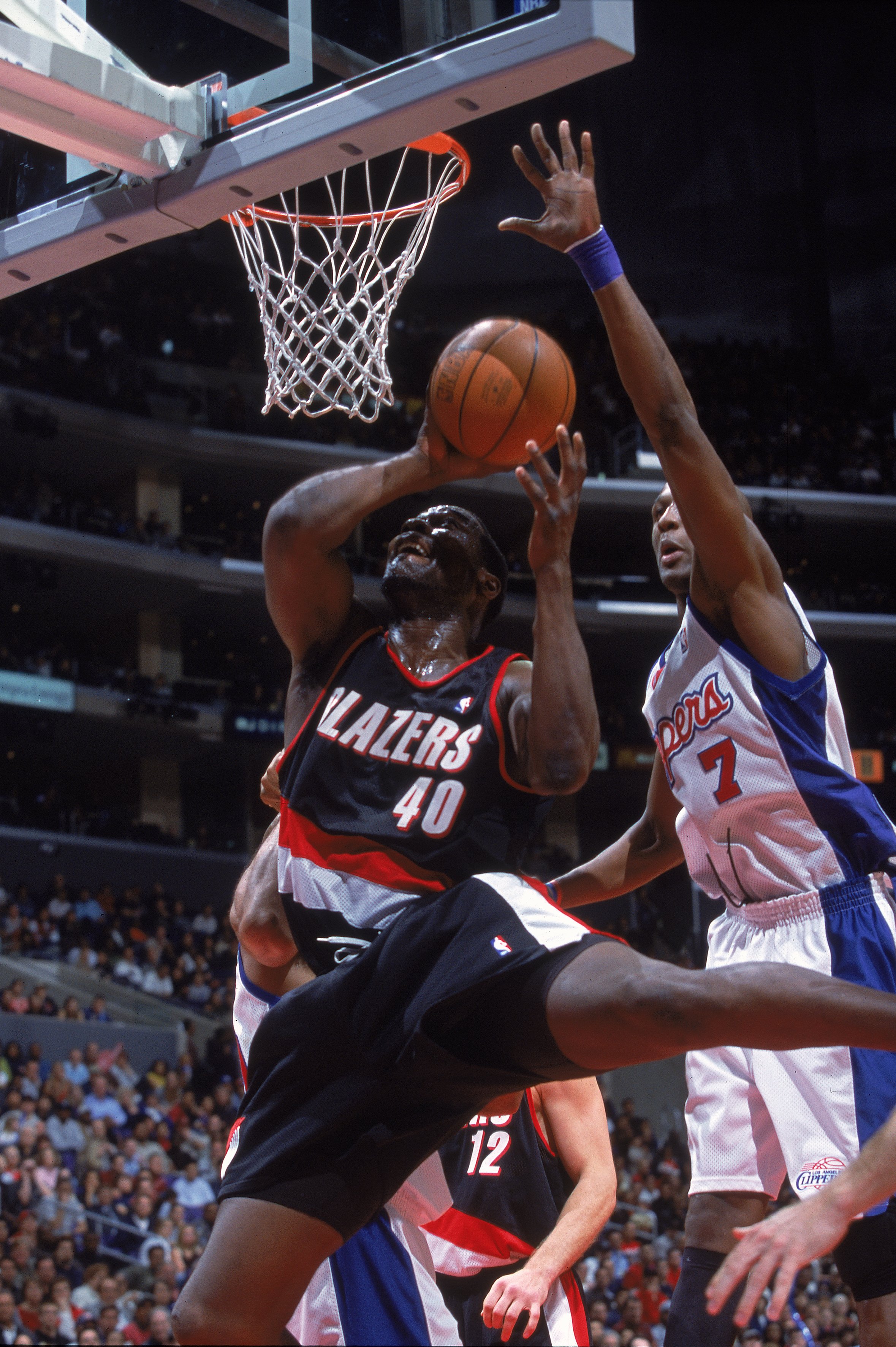 3 Feb 2001:  Shawn Kemp #40 of the Portland Trail Blazers takes a shot against Lamar Odom #7 of the Los Angeles Clippers during the game at the STAPLES Center in Los Angeles, California. The Clippers defeated the Trail Blazers 90-89.  NOTE TO USER: It is