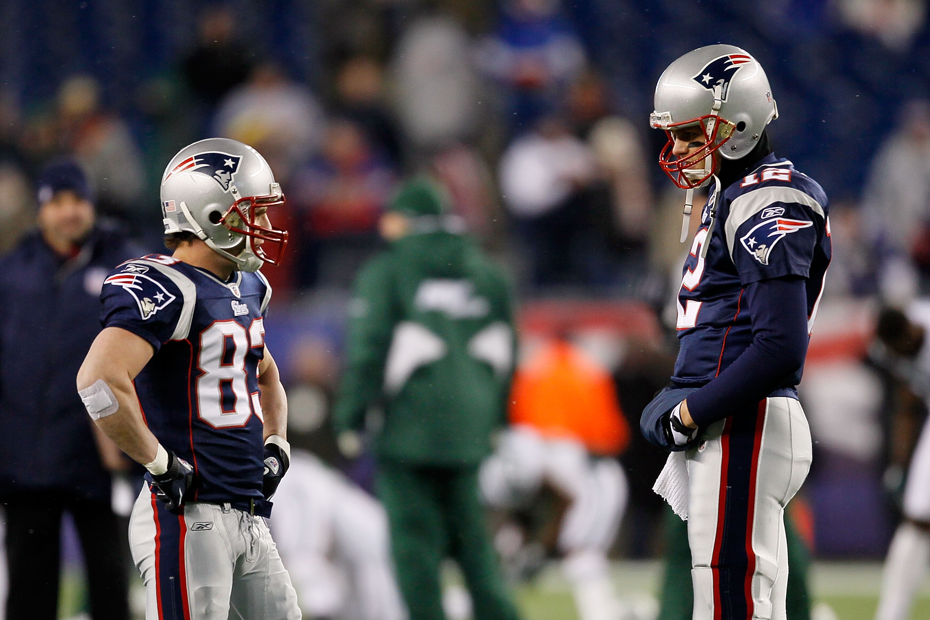 FOXBORO, MA - DECEMBER 06:  Tom Brady #12 (R) and Wes Welker #83 of the New England Patriots talk on the field during warms up against the New York Jets at Gillette Stadium on December 6, 2010 in Foxboro, Massachusetts.  (Photo by Jim Rogash/Getty Images)