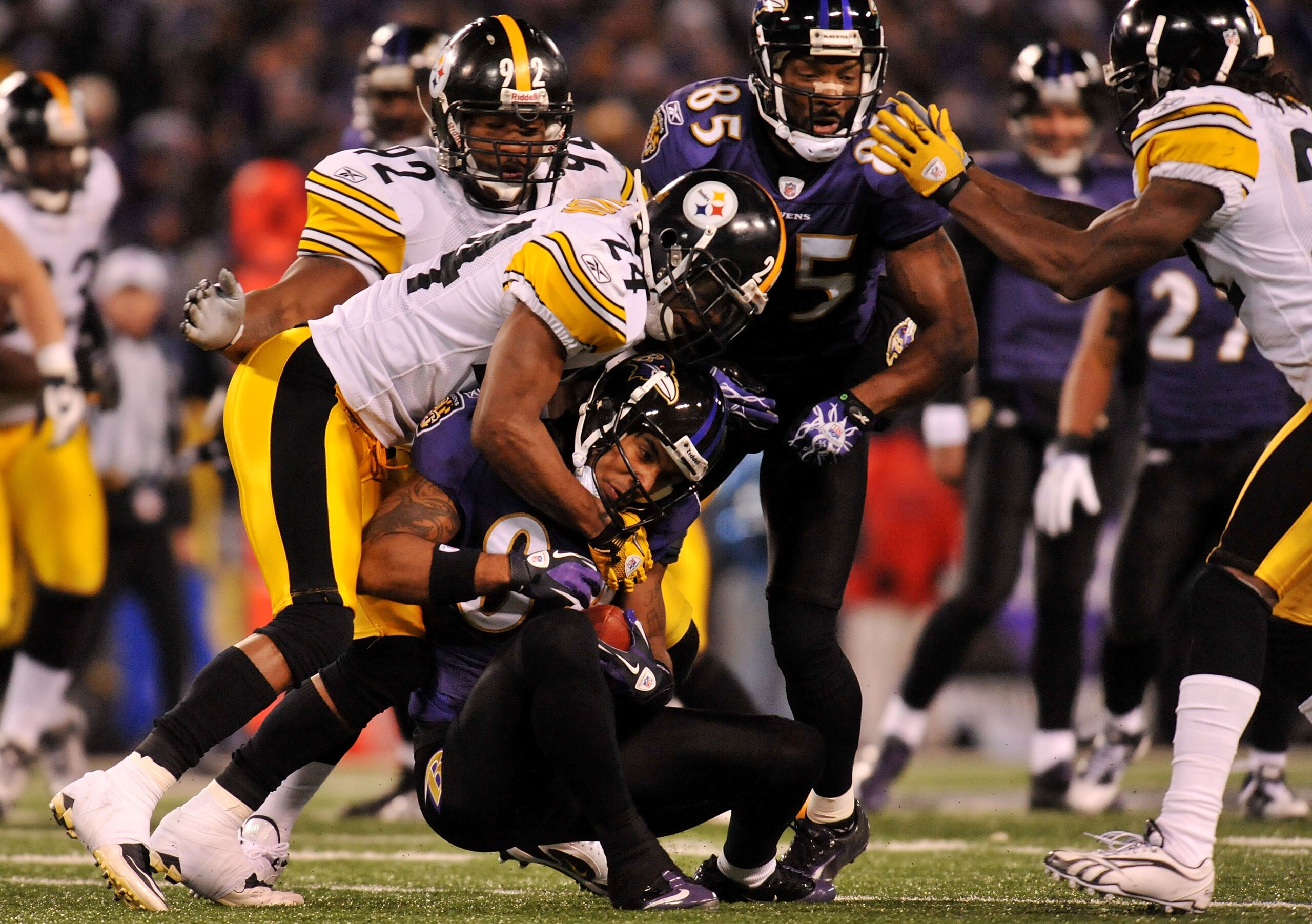 BALTIMORE, MD - DECEMBER 05:  Wide receiver T.J. Houshmandzadeh #84 of the Baltimore Ravens catches the ball against the Pittsburgh Steelers during the third quarter of the game at M&T Bank Stadium on December 5, 2010 in Baltimore, Maryland.  (Photo by La