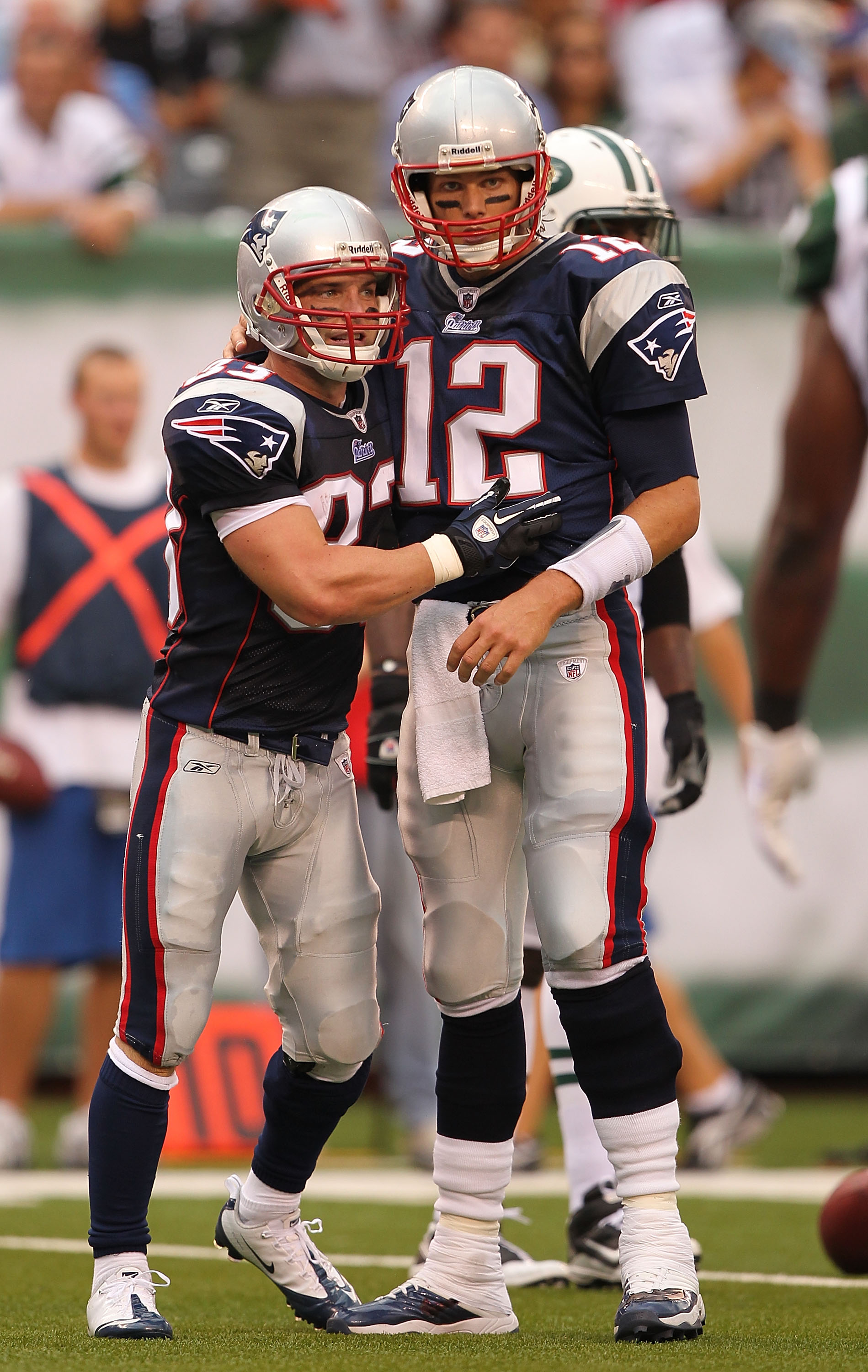 EAST RUTHERFORD, NJ - SEPTEMBER 19:  Wes Welker #83  celebrates with Tom Brady #12 of the New England Patriots against  the New York Jets during their  game on September 19, 2010 at the New Meadowlands Stadium  in East Rutherford, New Jersey.  (Photo by A
