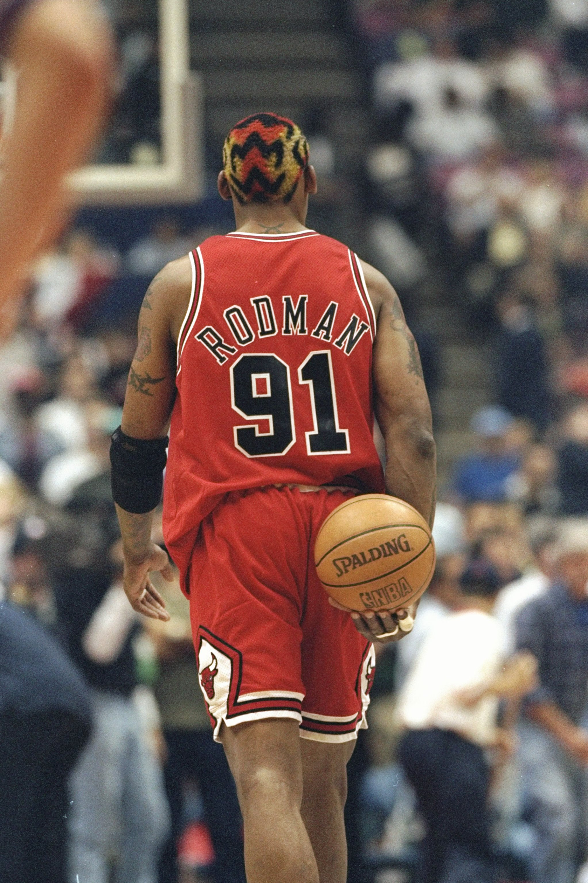 29 Apr 1998: Dennis Rodman #91 of the Chicago Bulls in action during the NBA Playoffs round 3 game against the New Jersey Nets at the Continental Airlines Arena in East Rutherford, New Jersey. The Bulls defeated the Nets 116-101.