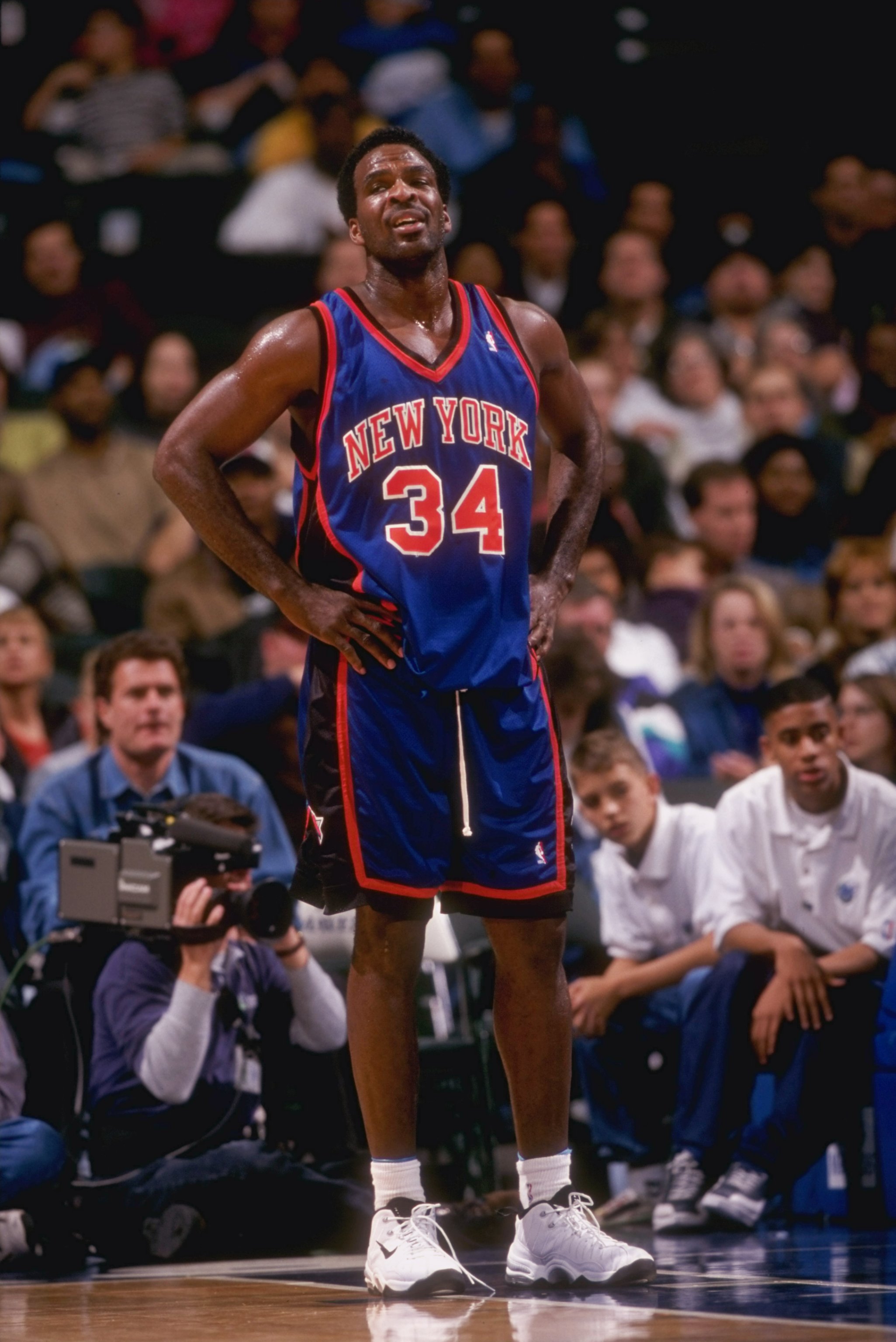 4 Dec 1997:  Forward Charles Oakley of the New York Knicks looks on during a game against the Dallas Mavericks at the Reunion Arena in Dallas, Texas.  The Mavericks won the game, 105-91. Mandatory Credit: Brian Bahr  /Allsport