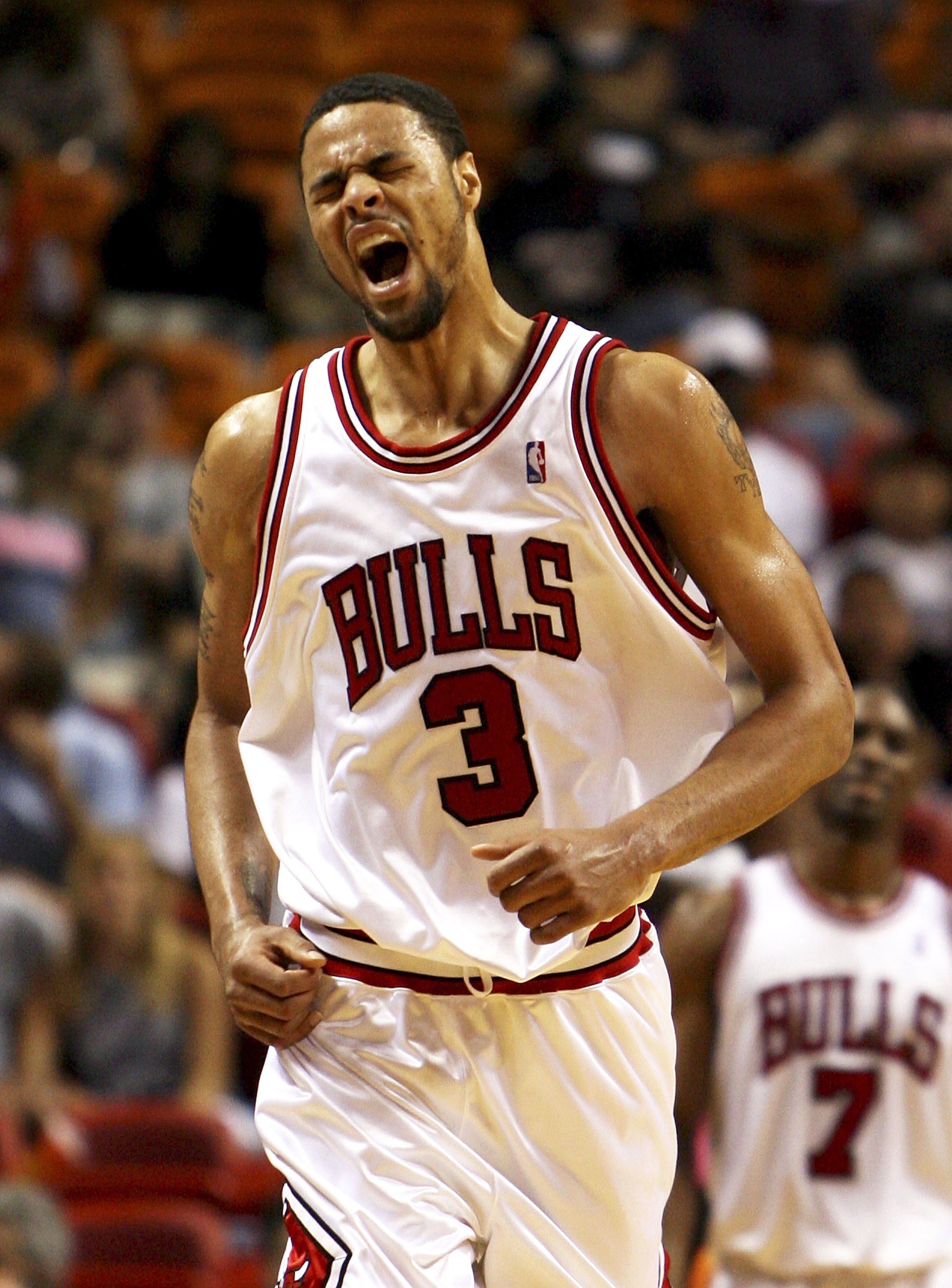 MIAMI - APRIL 16:  Tyson Chandler #3 of the Chicago Bulls celebrates after hitting a big shot in the fourth quarter against the Miami Heat on April 16, 2006 at American Airlines Arena in Miami, Florida. The Bulls defeated the Heat 117-93 and clinched a pl