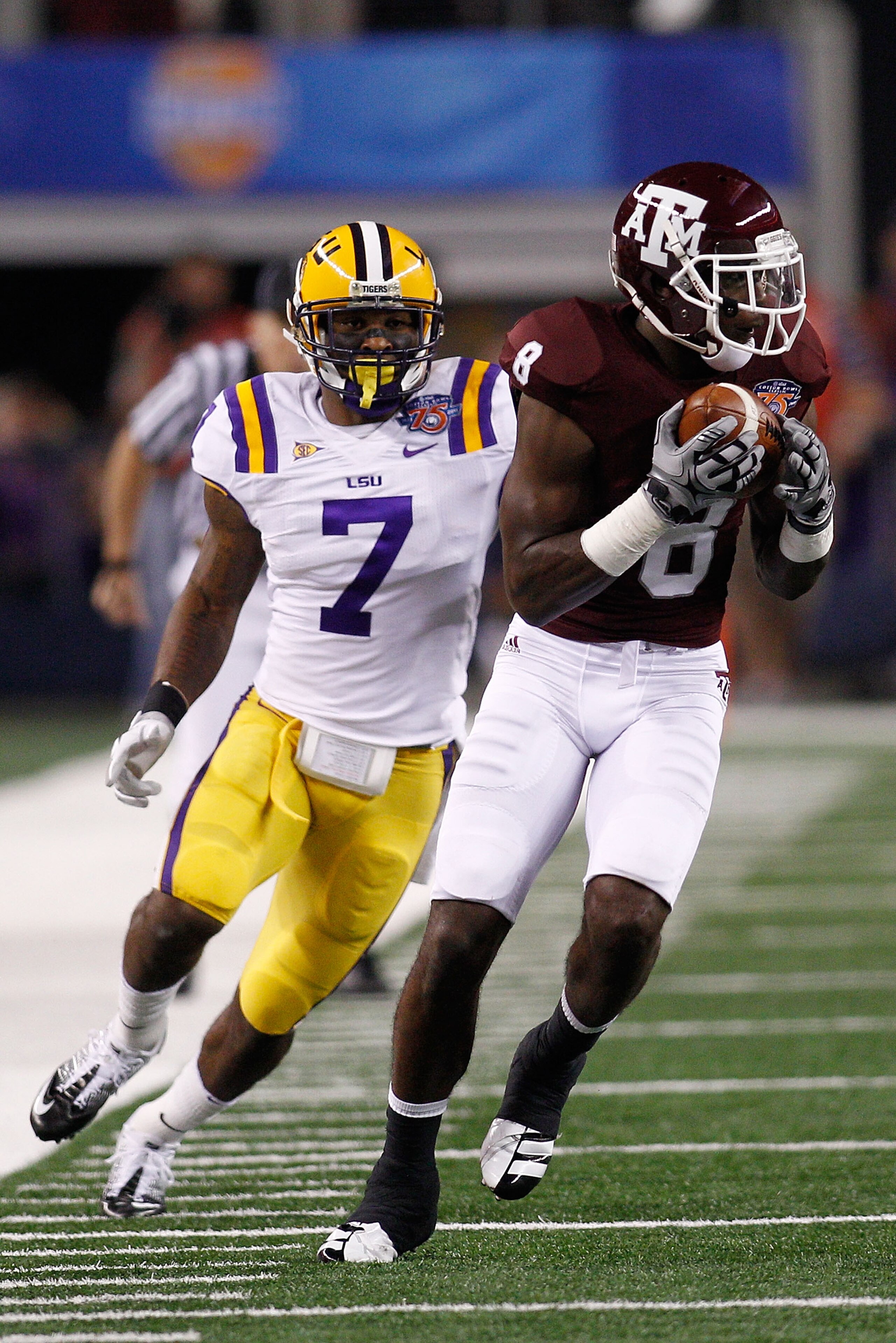 ARLINGTON, TX - JANUARY 07: Jeff Fuller #8 of the Texas A&M Aggies makes a catch over Patrick Peterson #7 of the Louisiana State University Tigers during the AT&T Cotton Bowl at Cowboys Stadium on January 7, 2011 in Arlington, Texas. (Photo by Chris Gra ARLINGTON, TX - JANUARY 07: Jeff Fuller #8 of the Texas A&M Aggies makes a catch over Patrick Peterson #7 of the Louisiana State University Tigers during the AT&T Cotton Bowl at Cowboys Stadium on January 7, 2011 in Arlington, Texas. (Photo by Chris Gra