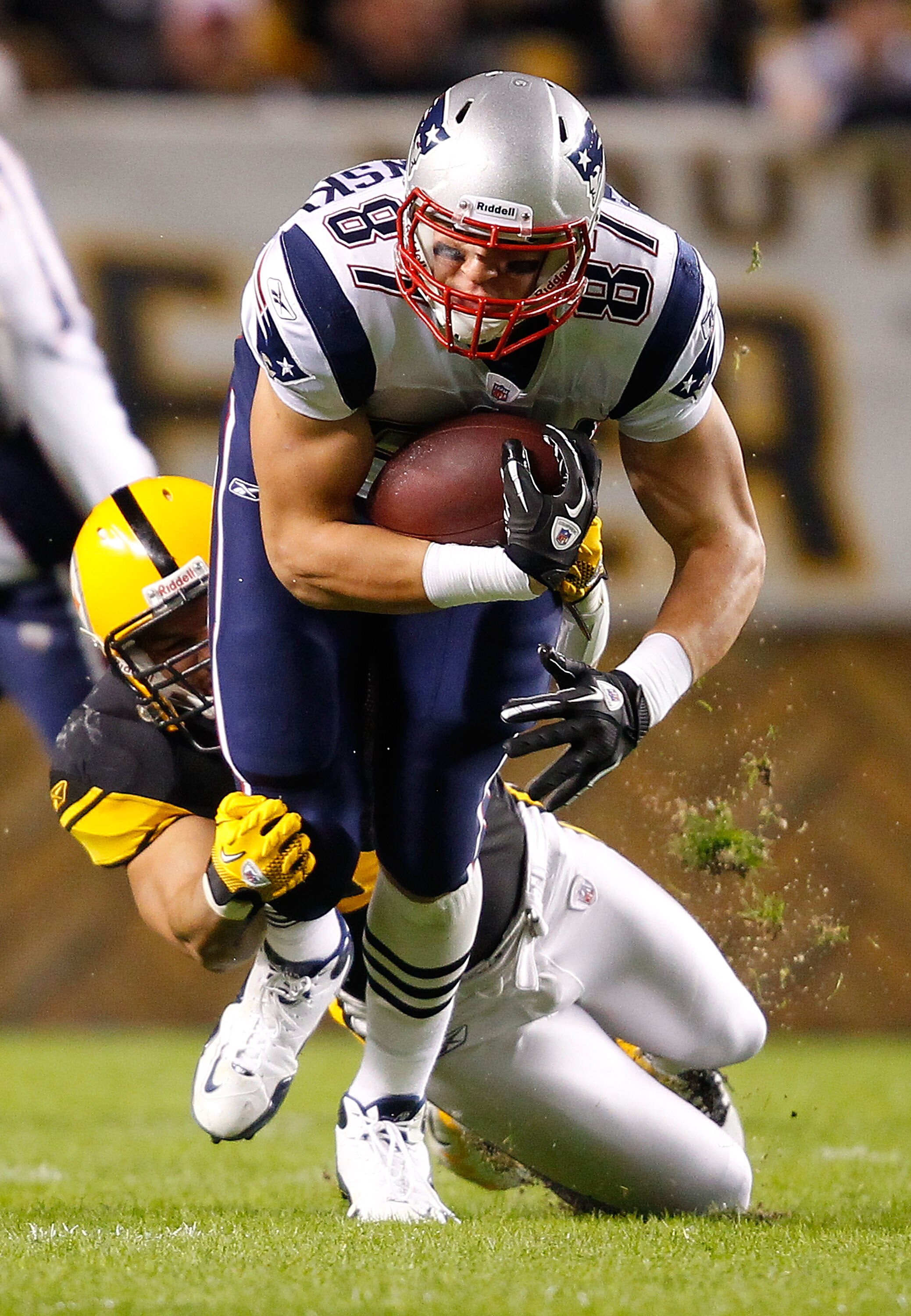PITTSBURGH, PA - NOVEMBER 14:  Rob Gronkowski #87 of the New England Patriots is tackled after a completed pass by James Farrior #51 of the Pittsburgh Steelers during the game on November 14, 2010 at Heinz Field in Pittsburgh, Pennsylvania.  (Photo by Jar
