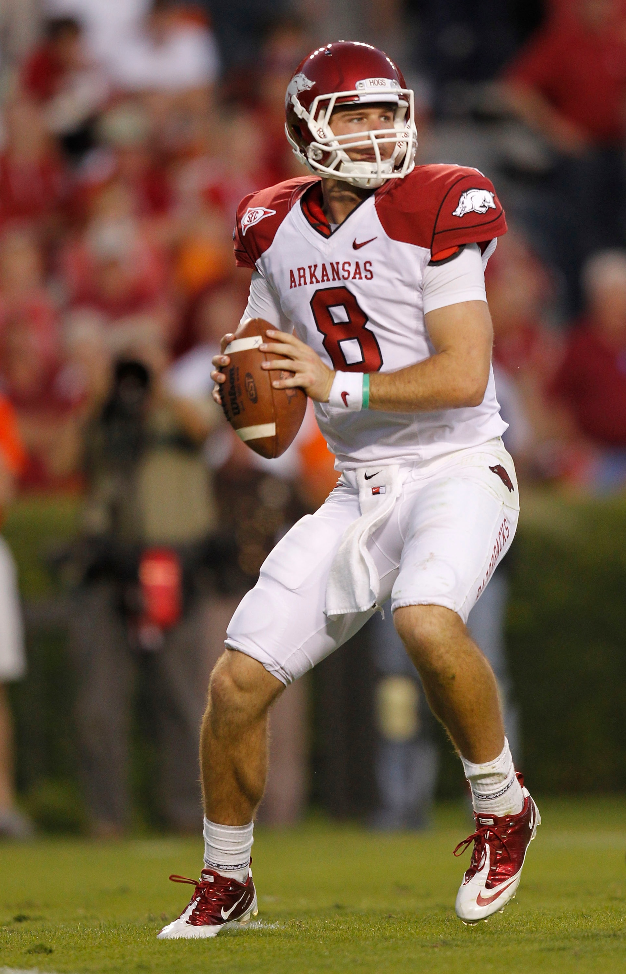 AUBURN, AL - OCTOBER 16:  Quarterback Tyler Wilson #8 of the Arkansas Razorbacks drops back and looks downfield for receiver during the game against the Auburn Tigers at Jordan-Hare Stadium on October 16, 2010 in Auburn, Alabama.  The Tigers beat the Razo