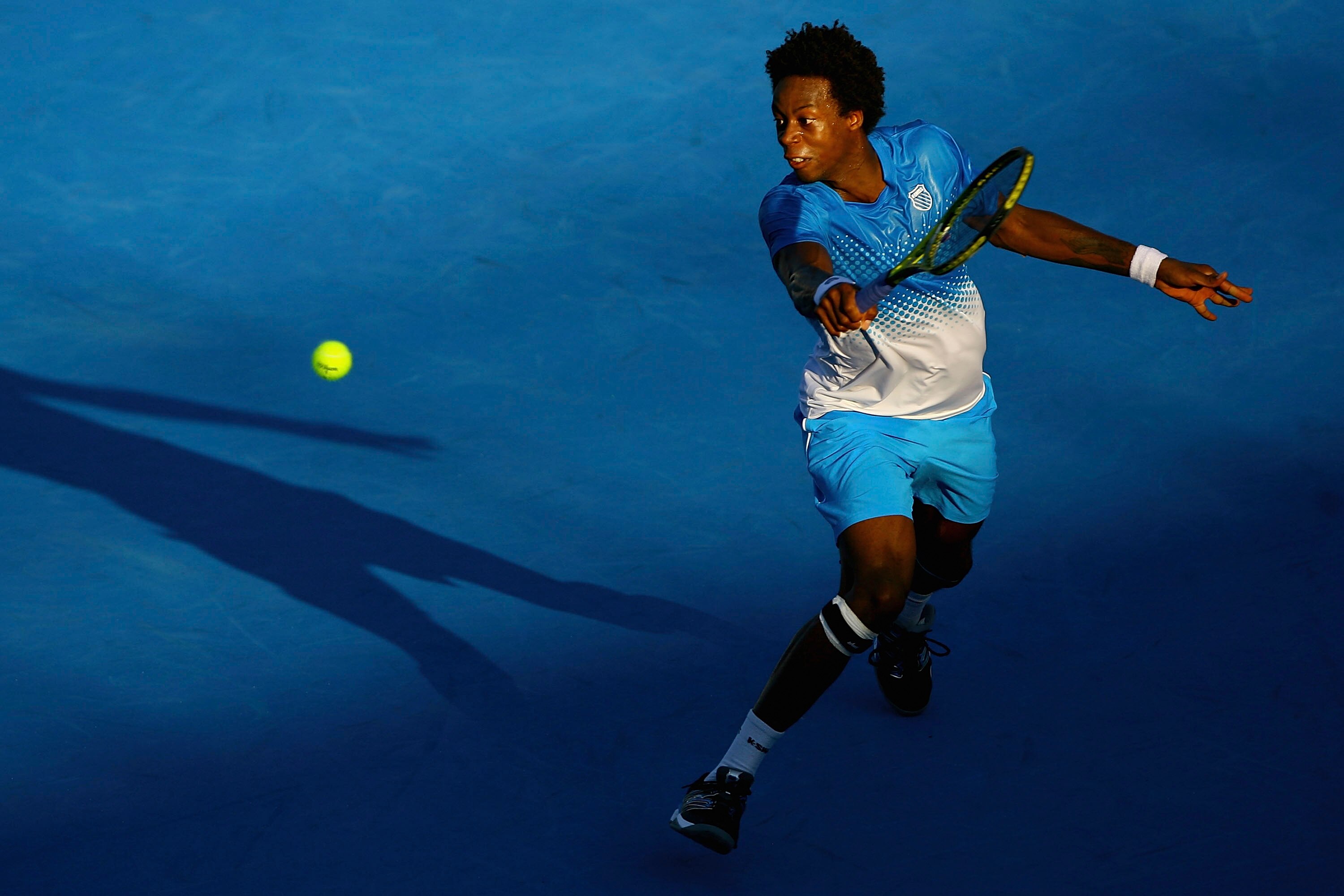MELBOURNE, AUSTRALIA - JANUARY 14:  Gael Monfils of France plays a backhand during his match against Jurgen Melzer of Austria during day three of the AAMI Classic at Kooyong on January 14, 2011 in Melbourne, Australia.  (Photo by Robert Prezioso/Getty Ima