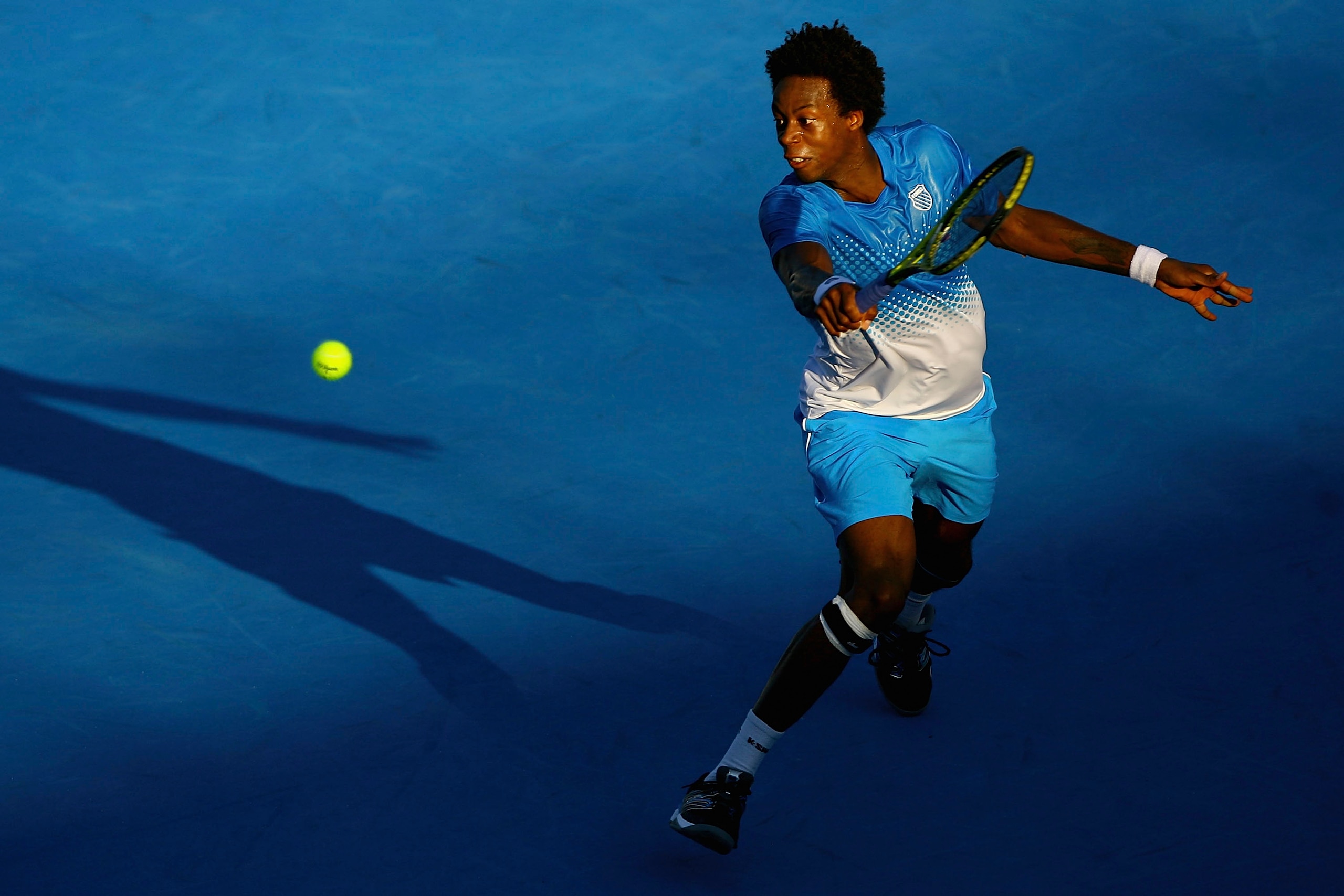 MELBOURNE, AUSTRALIA - JANUARY 14:  Gael Monfils of France plays a backhand during his match against Jurgen Melzer of Austria during day three of the AAMI Classic at Kooyong on January 14, 2011 in Melbourne, Australia.  (Photo by Robert Prezioso/Getty Ima