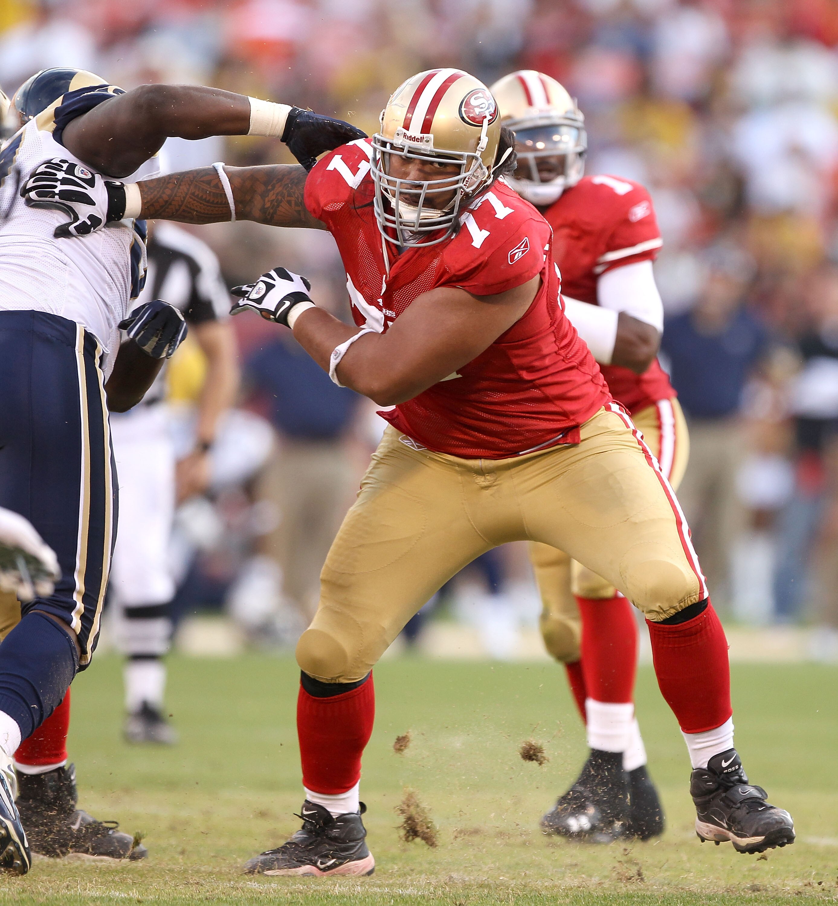 SAN FRANCISCO - NOVEMBER 14:  Mike Iupati #77 of the San Francisco 49ers in action against the St. Louis Rams at Candlestick Park on November 14, 2010 in San Francisco, California.  (Photo by Ezra Shaw/Getty Images)