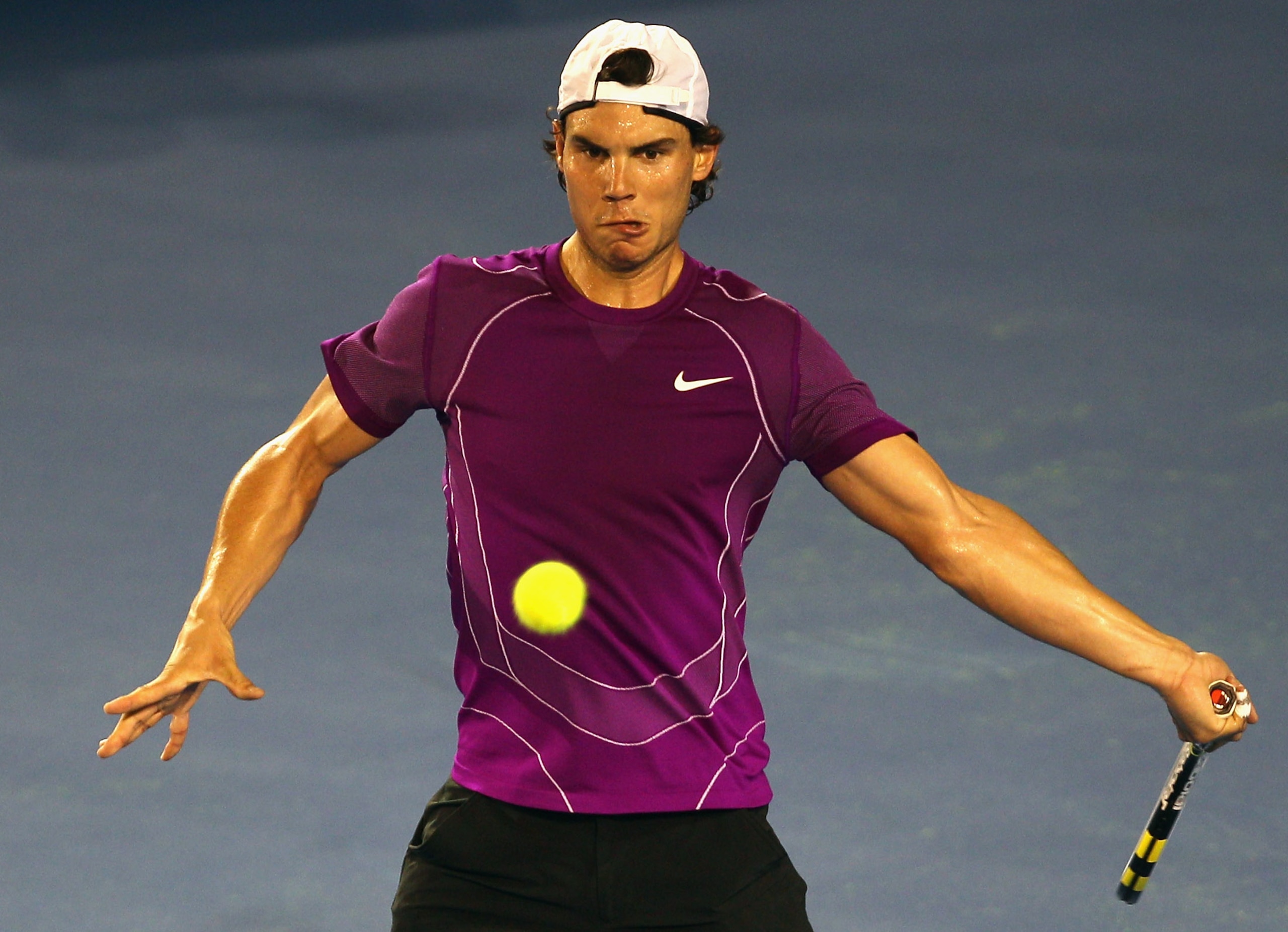 MELBOURNE, AUSTRALIA - JANUARY 12:  Rafael Nadal of Spain hits a forehand during a practice session ahead of the 2011 Australian Open at Melbourne Park on January 12, 2011 in Melbourne, Australia.  (Photo by Mark Dadswell/Getty Images)