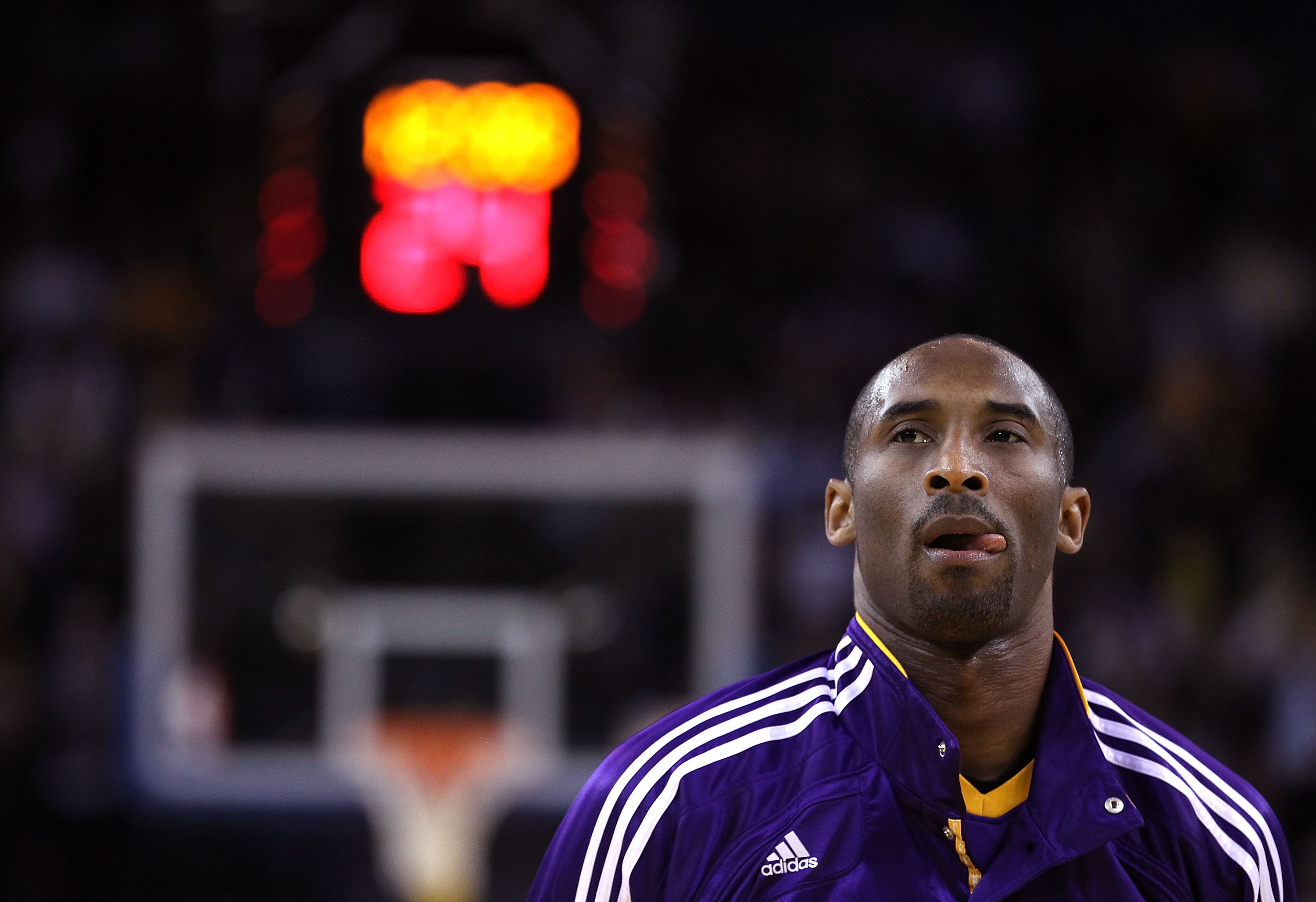 OAKLAND, CA - JANUARY 12: Kobe Bryant #24 of the Los Angeles Lakers stands for the National Anthem before their game against the Golden State Warriors at Oracle Arena on January 12, 2011 in Oakland, California. NOTE TO USER: User expressly acknowledges an